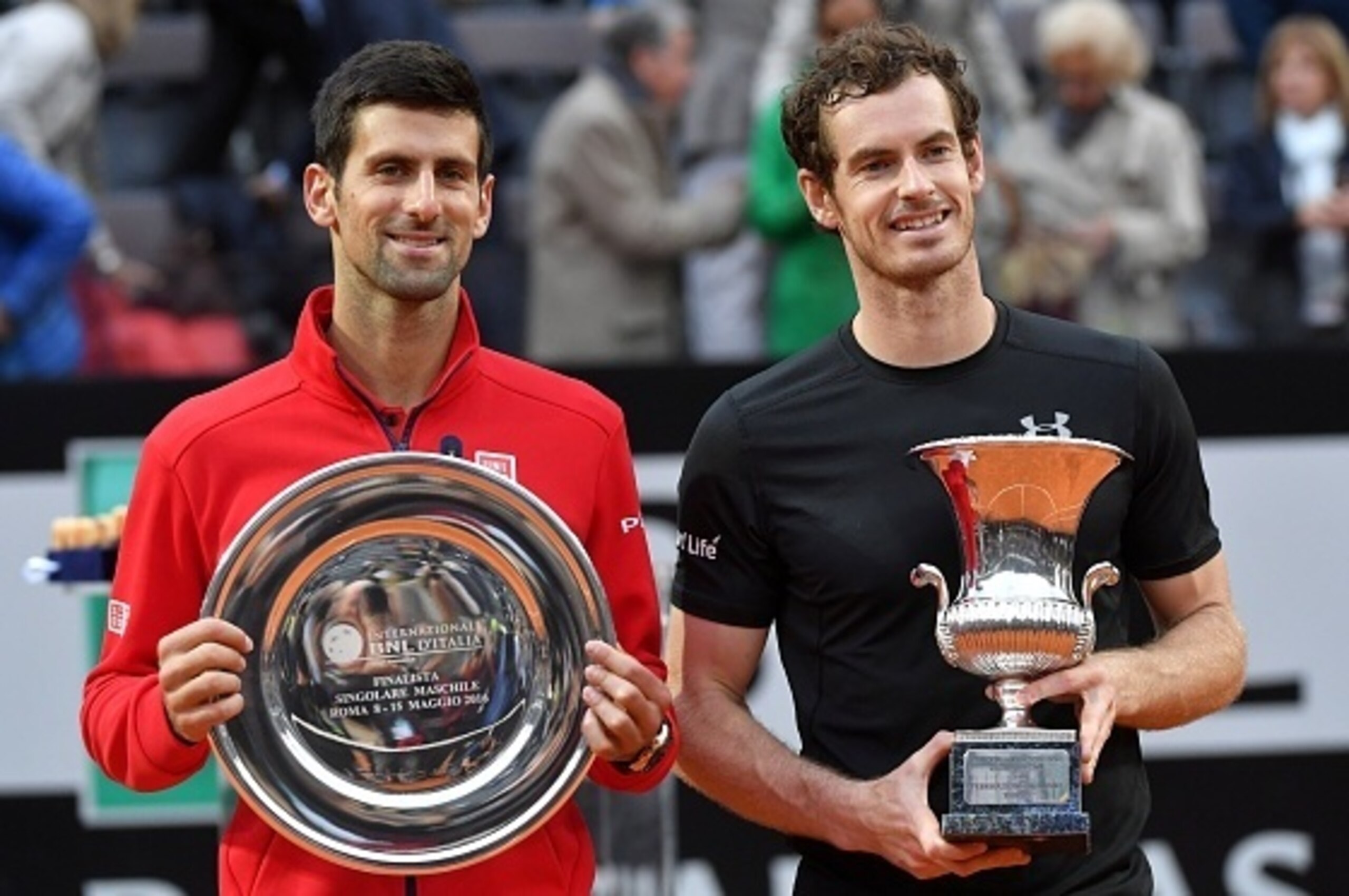 Britain's Andy Murray poses next to Novak Djokovic of Serbia after after winning the men's final match at the ATP Tennis Open on May 15, 2016 at the Foro Italico in Rome. / AFP / TIZIANA FABI        (Photo credit should read TIZIANA FABI/AFP/Getty Images)