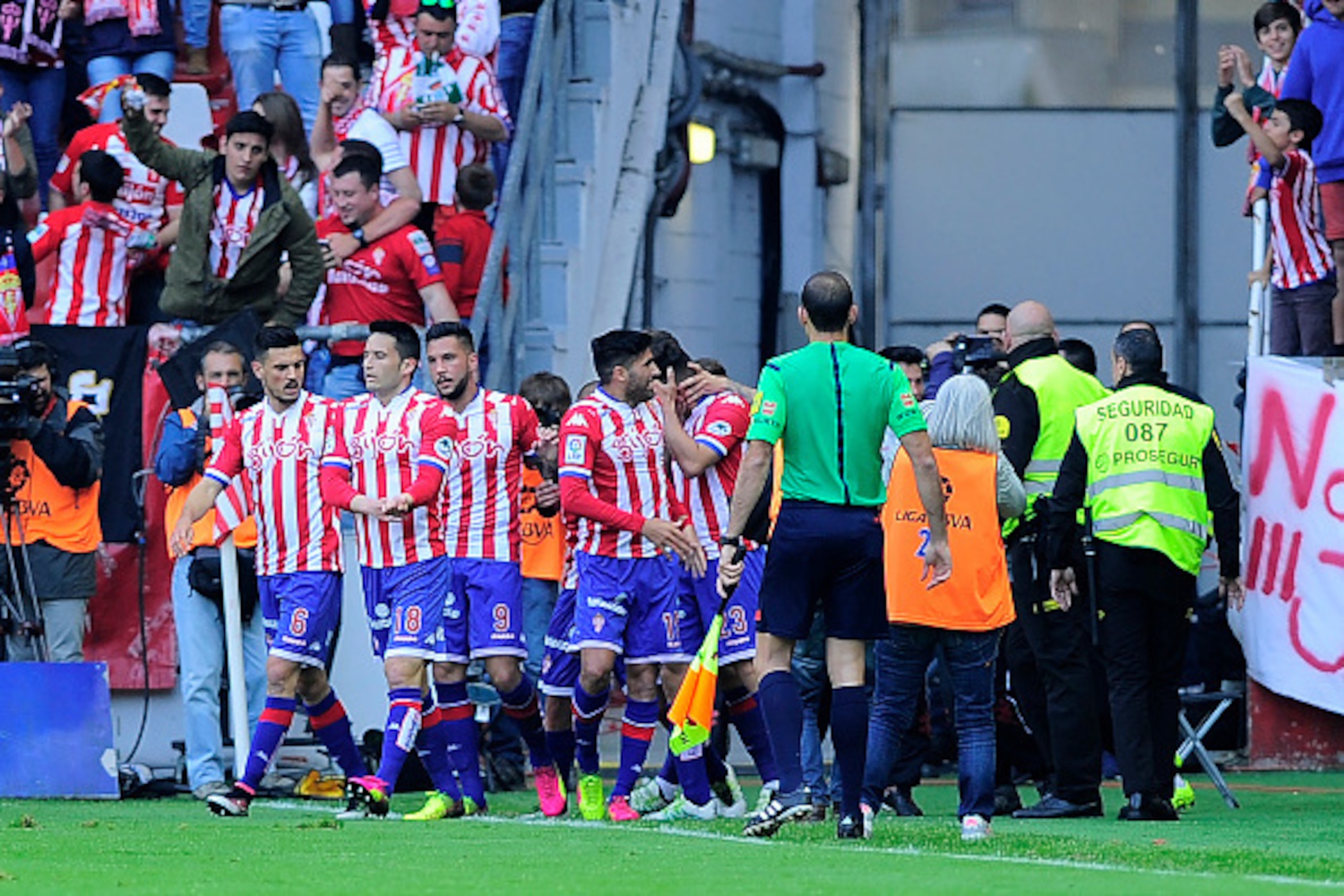 Sporting Gijon players celebrate a goal during the Spanish league football match Real Sporting de Gijon vs Villarreal CF at the El Molinon stadium in Gijon on May 15, 2016. / AFP / ANDER GILLENEA        (Photo credit should read ANDER GILLENEA/AFP/Getty I