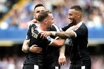 LONDON, ENGLAND - MAY 15:  Danny Drinkwater of Leicester City celebrates scoring his team's opening goal with Danny Simpson during the Barclays Premier League match between Chelsea and Leicester City at Stamford Bridge on May 15, 2016 in London, England. 