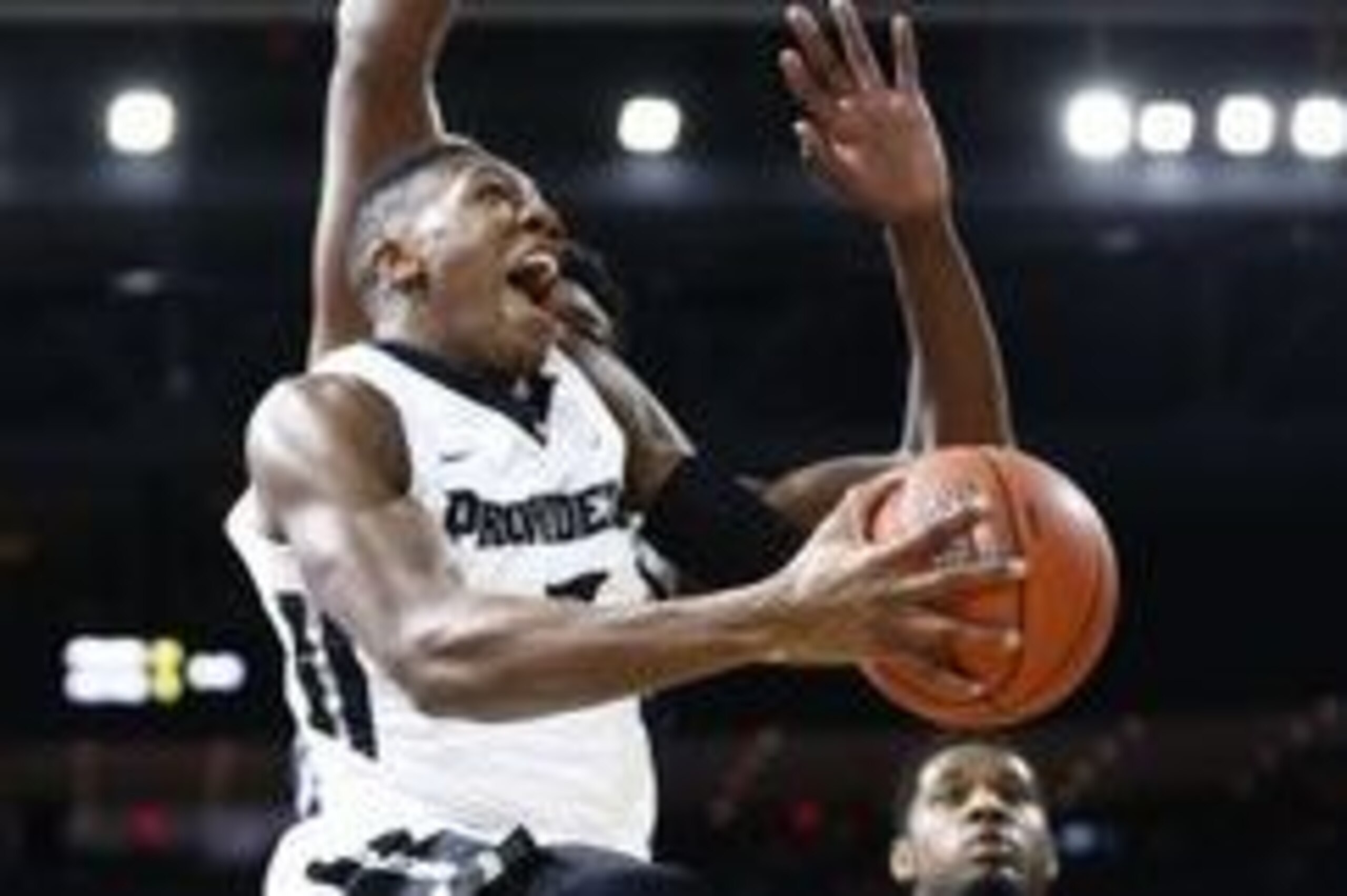Feb 13, 2016; Providence, RI, USA; Providence Friars guard Kris Dunn (3) shoots the ball against Georgetown Hoyas forward Marcus Derrickson (back) during the first half at Dunkin Donuts Center. Mandatory Credit: Mark L. Baer-USA TODAY Sports