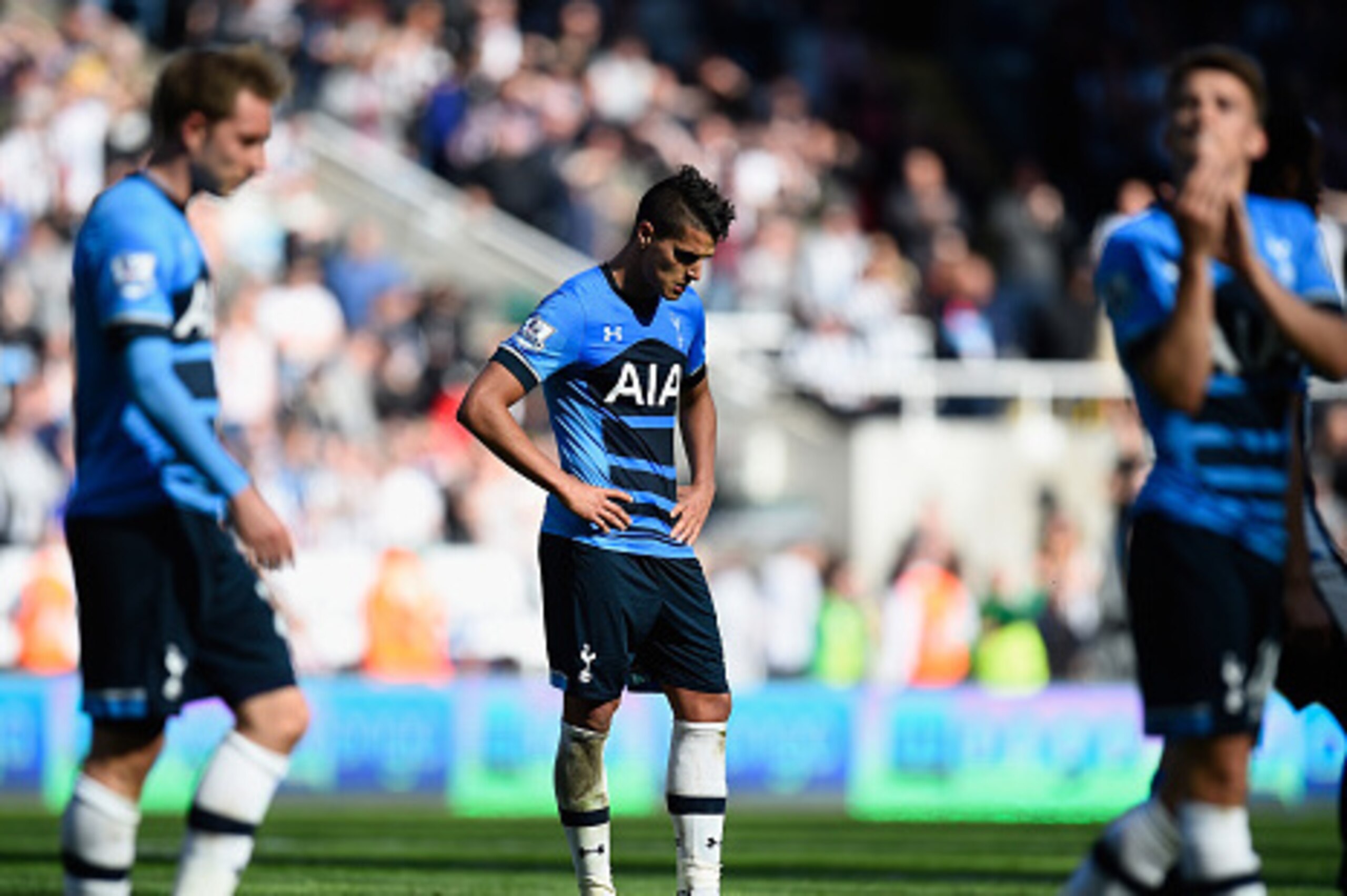 NEWCASTLE UPON TYNE, ENGLAND - MAY 15:  Erik Lamela (c) of Tottenham Hotspur looks dejected after  the Premier League match between Newcastle United and Tottenham Hotspur at St James' Park on May 15, 2016 in Newcastle upon Tyne, England.  (Photo by Stu Fo