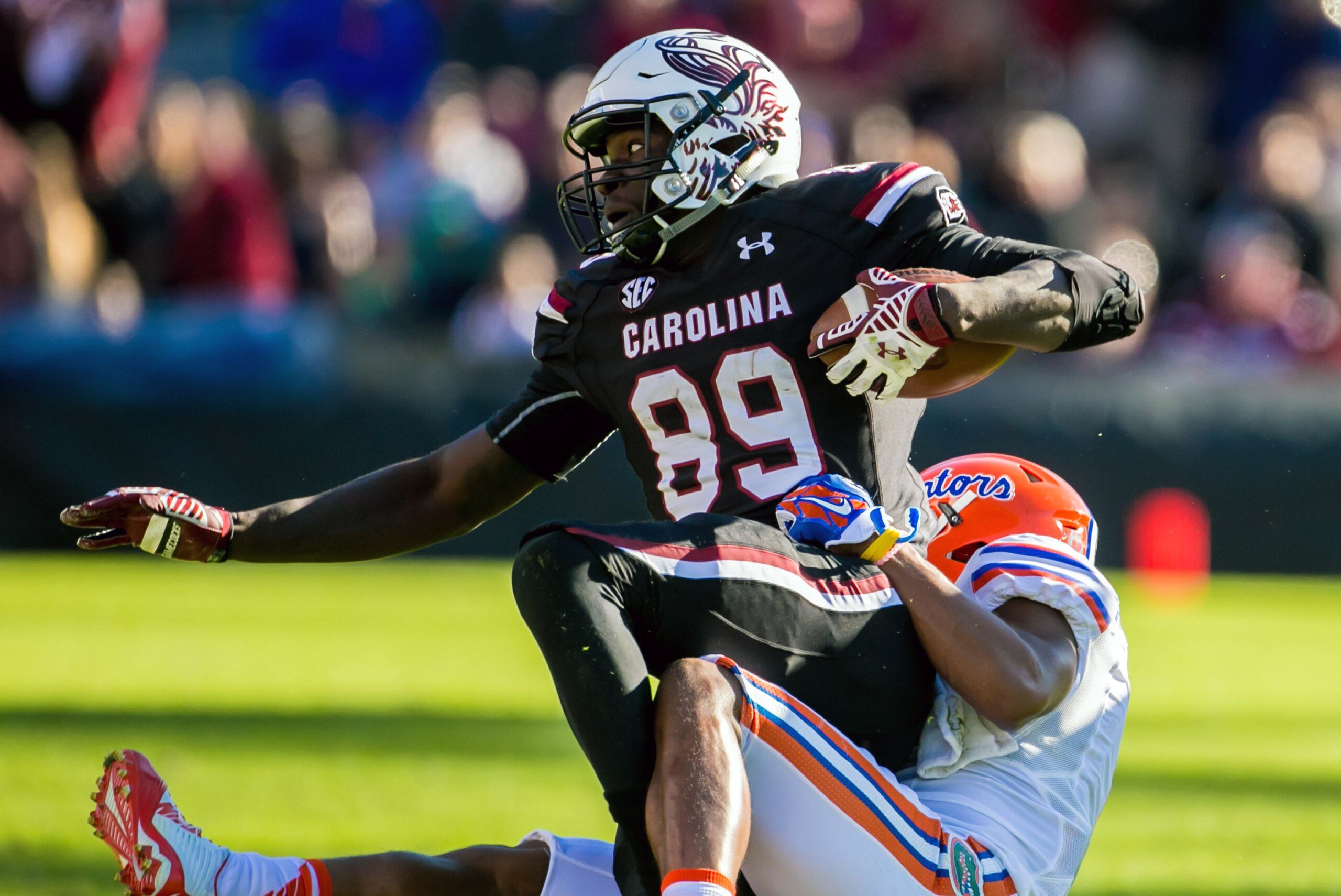 Nov 14, 2015; Columbia, SC, USA; South Carolina Gamecocks tight end Jerell Adams (89) is brought down by Florida Gators defensive back Vernon Hargreaves III (1) in the second half at Williams-Brice Stadium. Mandatory Credit: Jeff Blake-USA TODAY Sports