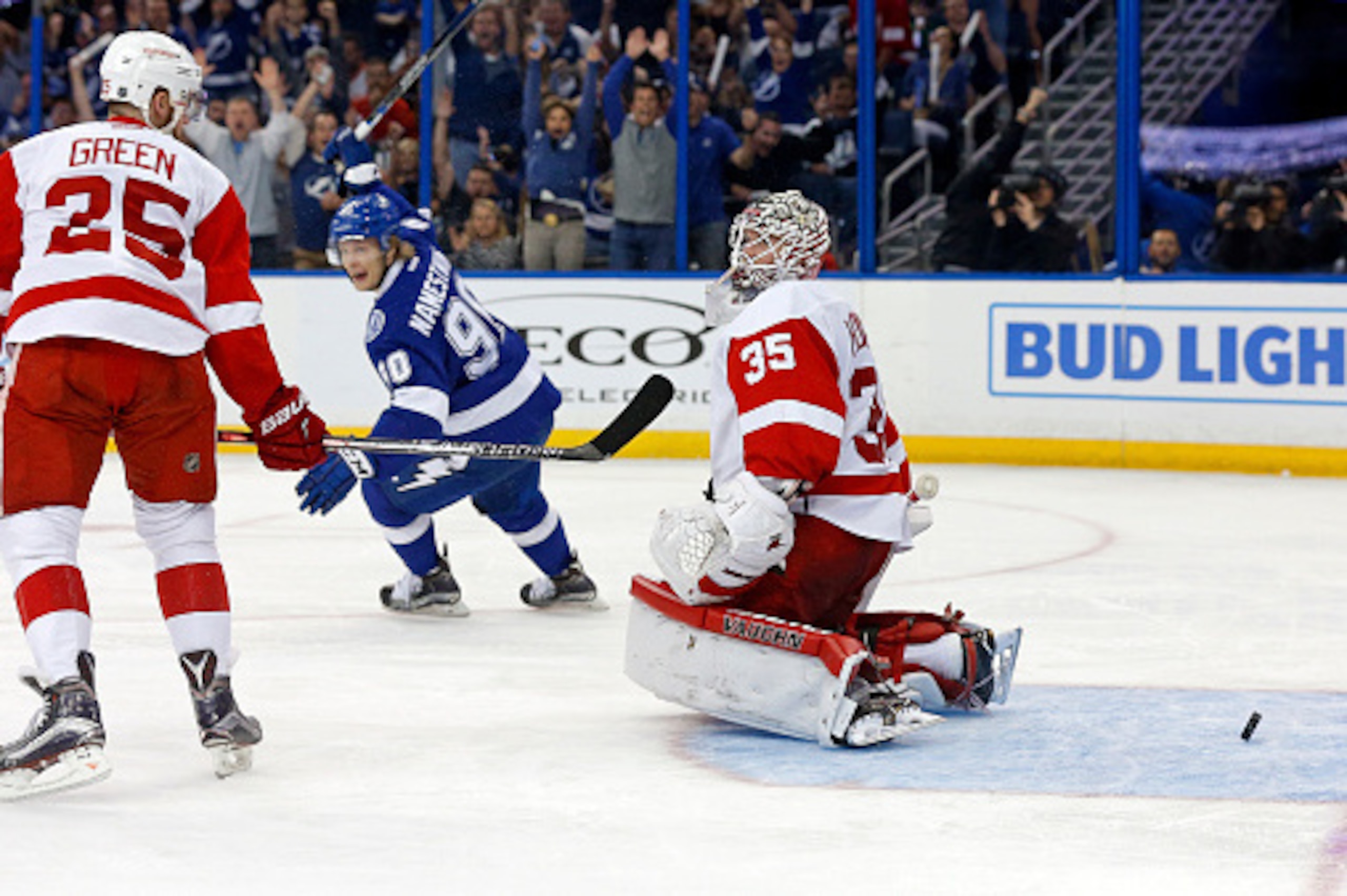 TAMPA, FL - APRIL 15:  Vladislav Namestnikov #90 of the Tampa Bay Lightning celebrates a goal as Mike Green #25 and Jimmy Howard #35 of the Detroit Red Wings react during the second period in Game Two of the Eastern Conference Quarterfinals during the 201