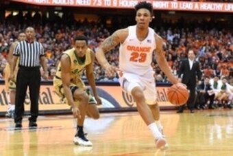 Jan 28, 2016; Syracuse, NY, USA; Syracuse Orange guard Malachi Richardson (23) dribbles the ball past Notre Dame Fighting Irish forward V.J. Beachem (3) during the second half at the Carrier Dome. The Orange won 81-66. Mandatory Credit: Rich Barnes-USA TO