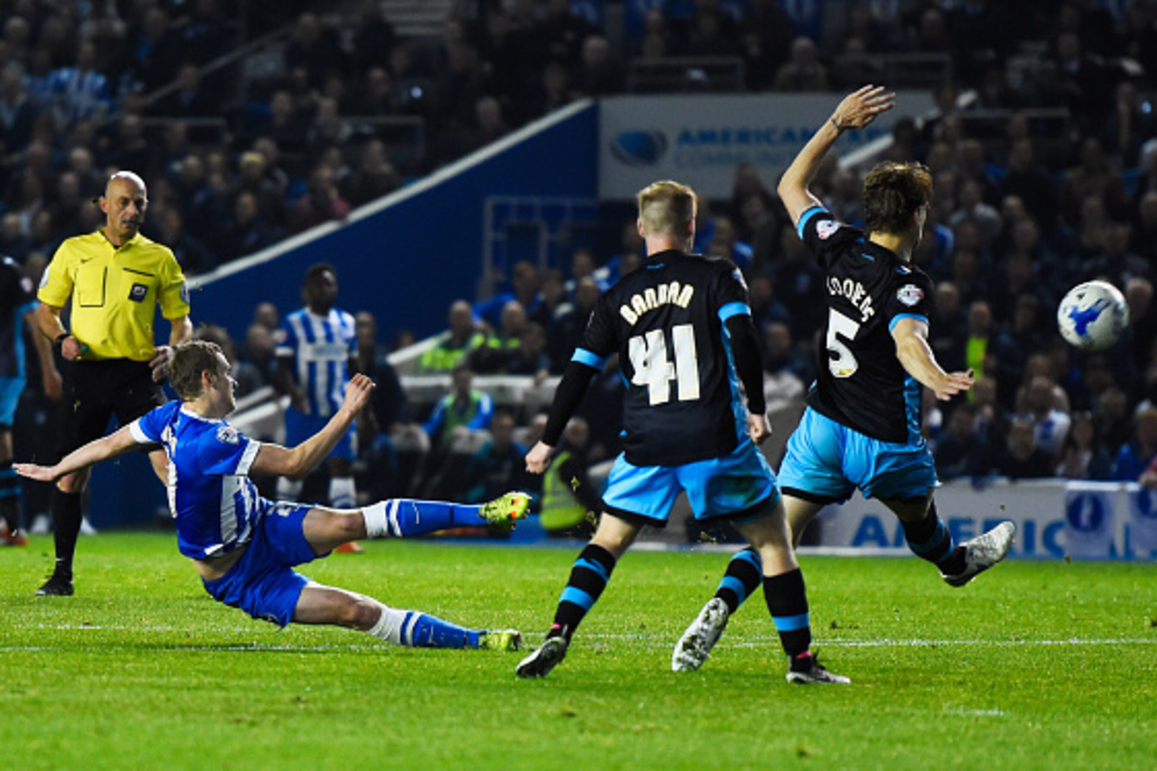 BRIGHTON, UNITED KINGDOM - MAY 16: James Wilson of Brighton and Hove Albion misses as chance as he shoots past Barry Bannan (41) and Glenn Loovens of Sheffield Wednesday (5) during the Sky Bet Championship Play Off semi final second leg match between Bri BRIGHTON, UNITED KINGDOM - MAY 16: James Wilson of Brighton and Hove Albion misses as chance as he shoots past Barry Bannan (41) and Glenn Loovens of Sheffield Wednesday (5) during the Sky Bet Championship Play Off semi final second leg match between Bri