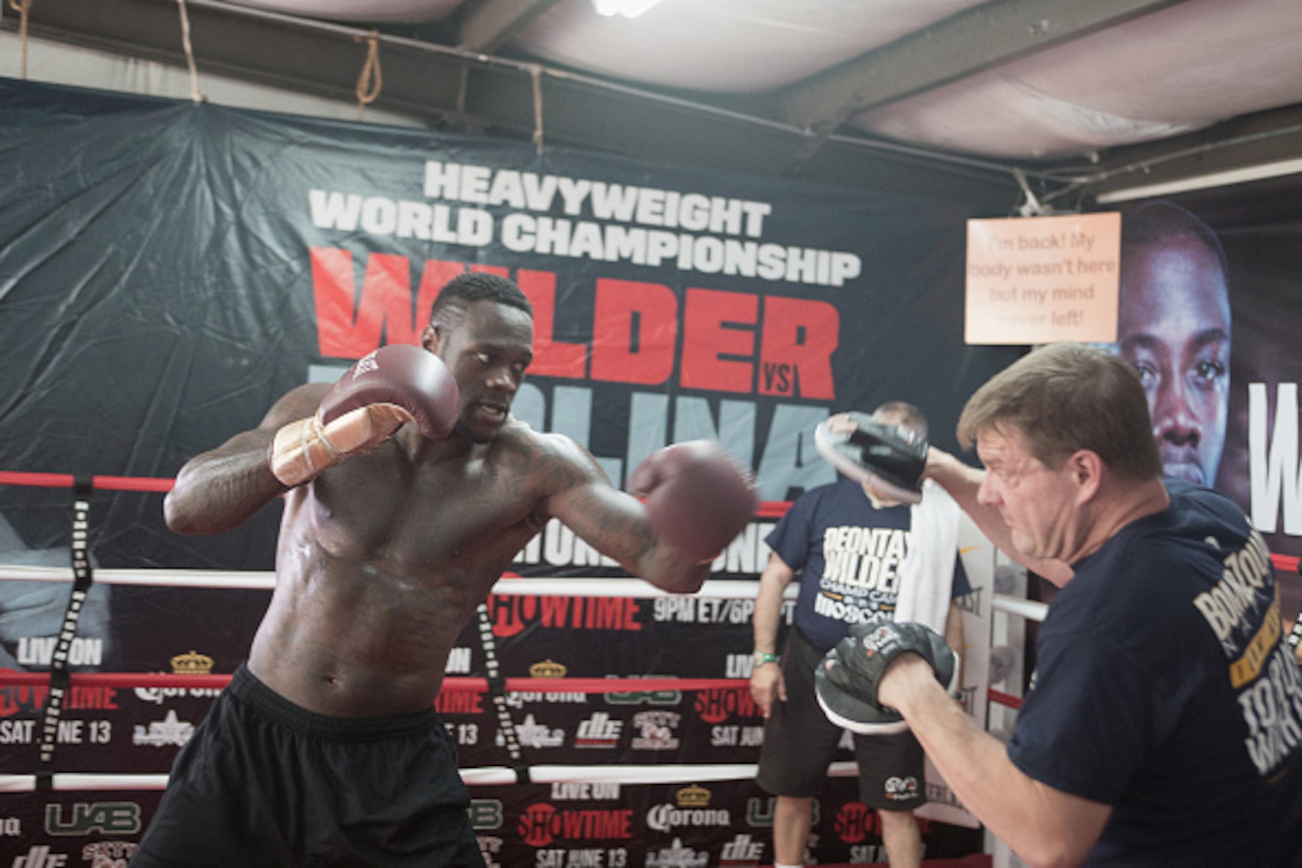 NORTHPORT, AL - APRIL 19: WBC World Heavyweight Champion Deontay Wilder works with trainer Jay Deas during a media session at Skyy Boxing on April 19, 2016 in Northport, Alabama. (Photo by David A. Smith/Getty Images) NORTHPORT, AL - APRIL 19: WBC World Heavyweight Champion Deontay Wilder works with trainer Jay Deas during a media session at Skyy Boxing on April 19, 2016 in Northport, Alabama. (Photo by David A. Smith/Getty Images)