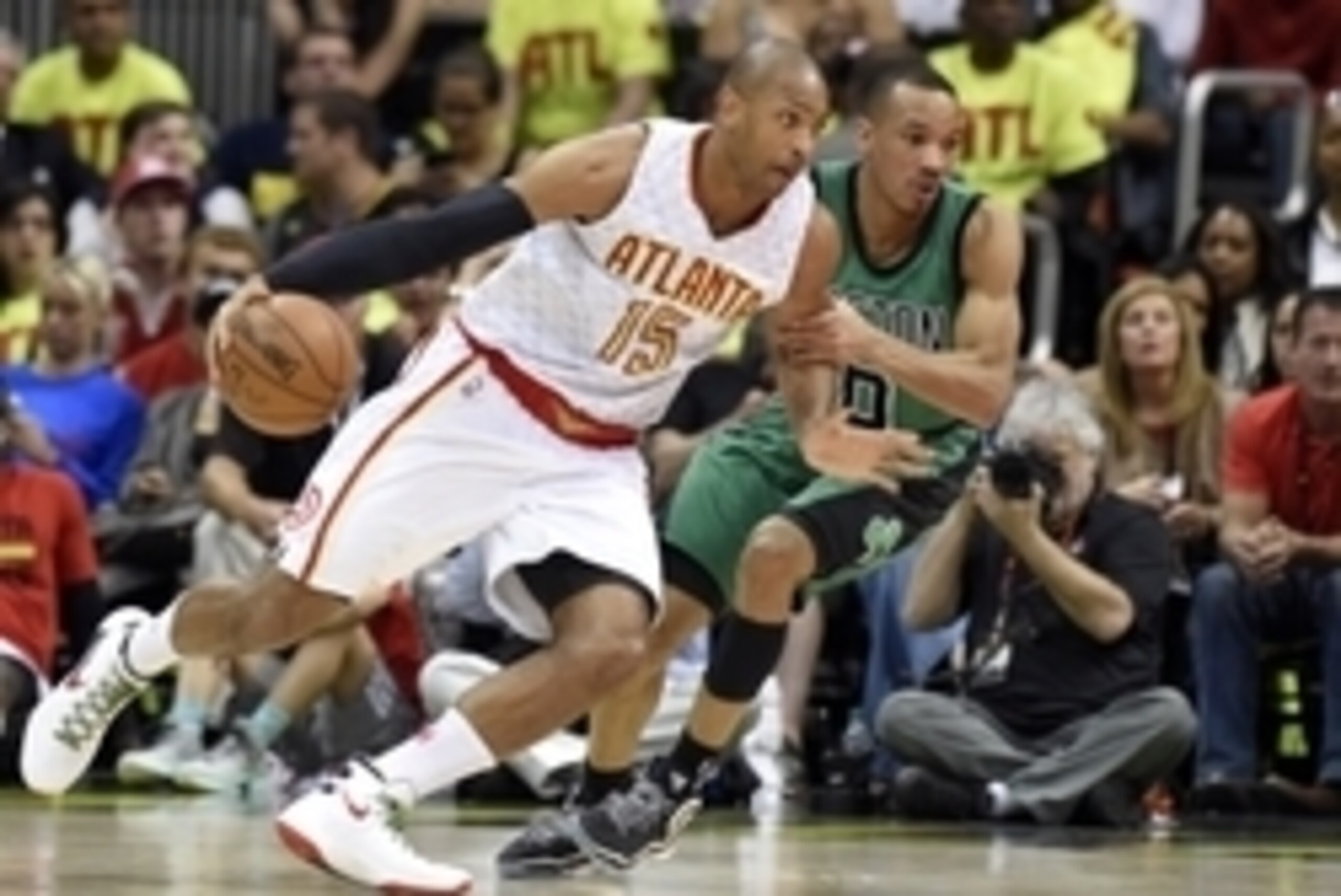 Apr 16, 2016; Atlanta, GA, USA; Atlanta Hawks center Al Horford (15) moves the ball against Boston Celtics guard Avery Bradley (0) during the second half in game one of the first round of the NBA Playoffs at Philips Arena. Mandatory Credit: John David Mer Apr 16, 2016; Atlanta, GA, USA; Atlanta Hawks center Al Horford (15) moves the ball against Boston Celtics guard Avery Bradley (0) during the second half in game one of the first round of the NBA Playoffs at Philips Arena. Mandatory Credit: John David Mer