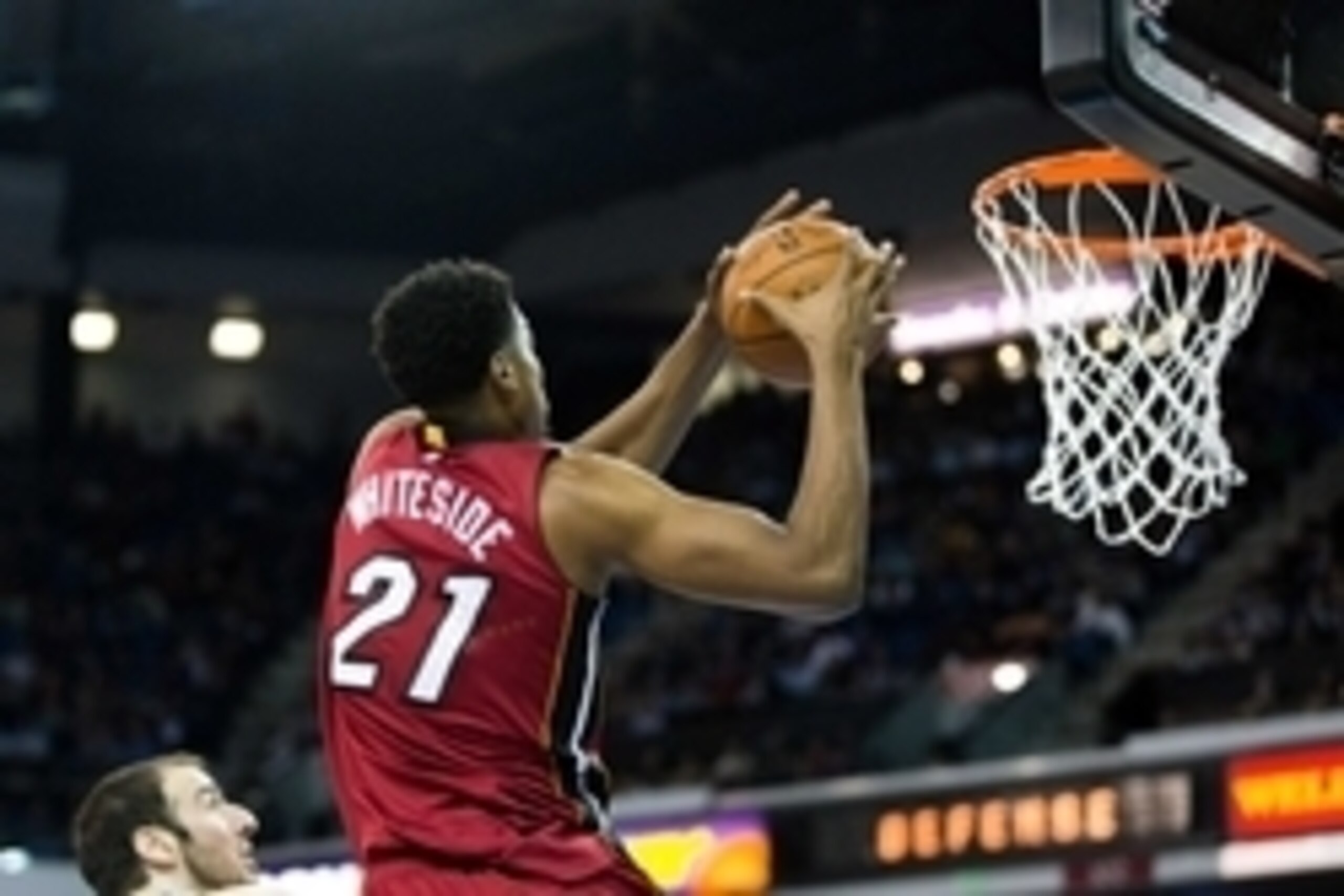 Apr 1, 2016; Sacramento, CA, USA; Miami Heat center Hassan Whiteside (21) dunks the ball as Sacramento Kings center Kosta Koufos (41) defends in the second quarter at Sleep Train Arena. Mandatory Credit: John Hefti-USA TODAY Sports Apr 1, 2016; Sacramento, CA, USA; Miami Heat center Hassan Whiteside (21) dunks the ball as Sacramento Kings center Kosta Koufos (41) defends in the second quarter at Sleep Train Arena. Mandatory Credit: John Hefti-USA TODAY Sports
