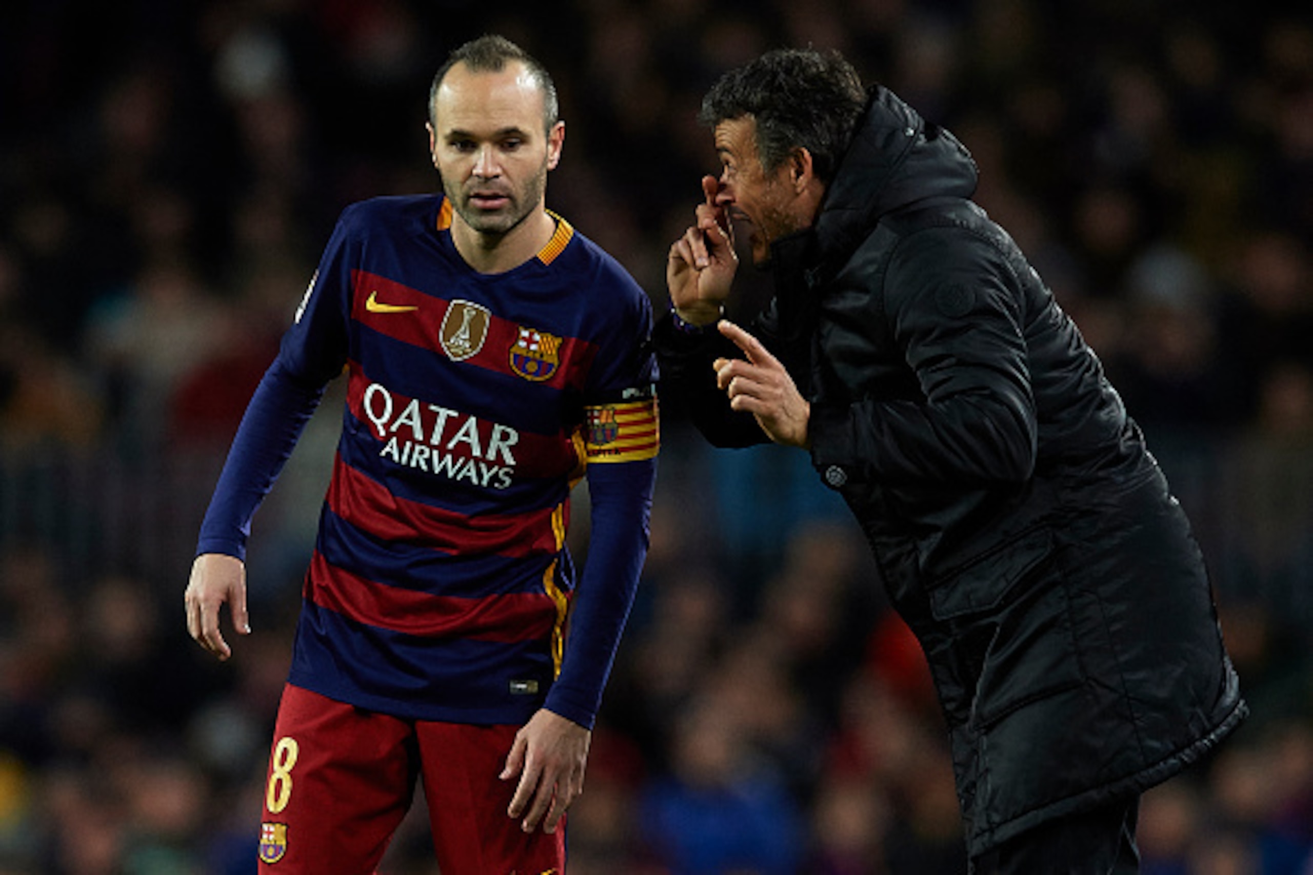 BARCELONA, SPAIN - JANUARY 06:  FC Barcelona manager Luis Enrique gives instructions to his player Andres Iniesta  during the Copa del Rey Round of 16 match between FC Barcelona and Real CD Espanyol at Camp Nou on January 6, 2016 in Barcelona, Spain.  (Ph
