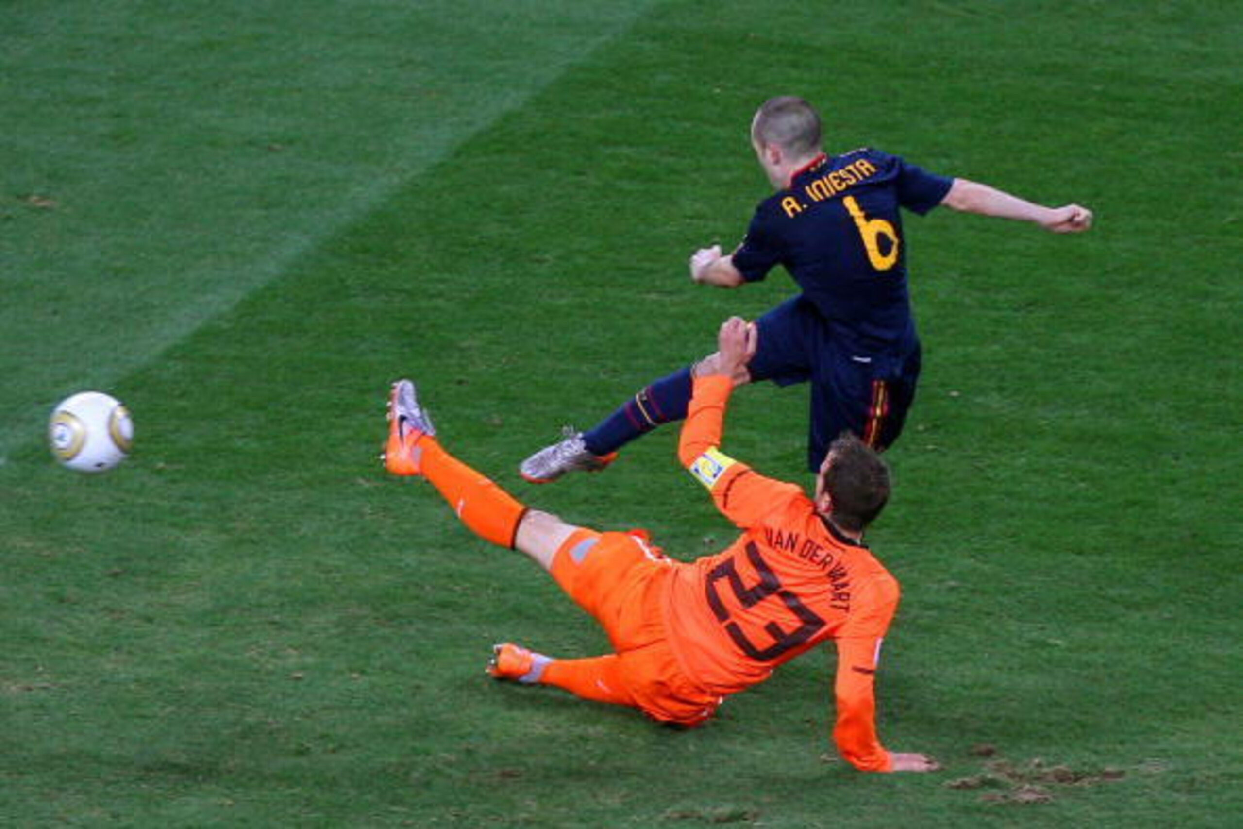 JOHANNESBURG, SOUTH AFRICA - JULY 11:  Andres Iniesta of Spain scores the winning goal during the 2010 FIFA World Cup South Africa Final match between Netherlands and Spain at Soccer City Stadium on July 11, 2010 in Johannesburg, South Africa.  (Photo by 