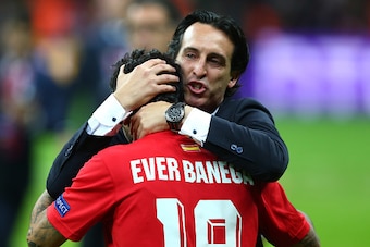 WARSAW, POLAND - MAY 27:  Unai Emery, coach of Sevilla celebrates with Ever Banega of Sevilla after the UEFA Europa League Final match between FC Dnipro Dnipropetrovsk and FC Sevilla on May 27, 2015 in Warsaw, Poland.  (Photo by Martin Rose/Getty Images)
