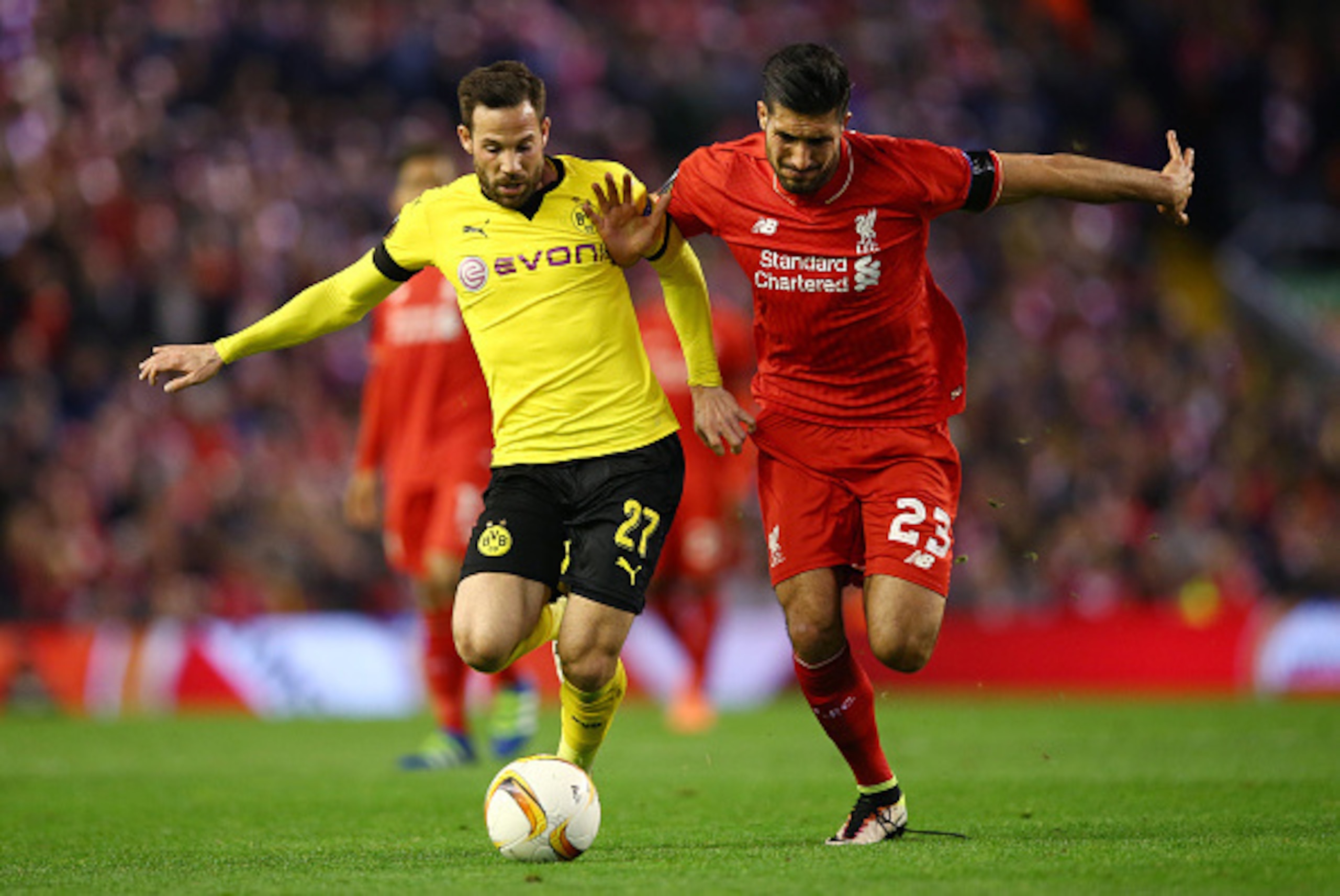 LIVERPOOL, ENGLAND - APRIL 14:  Gonzalo Castro of Borussia Dortmund takes on Emre Can of Liverpool during the UEFA Europa League quarter final, second leg match between Liverpool and Borussia Dortmund at Anfield on April 14, 2016 in Liverpool, United King