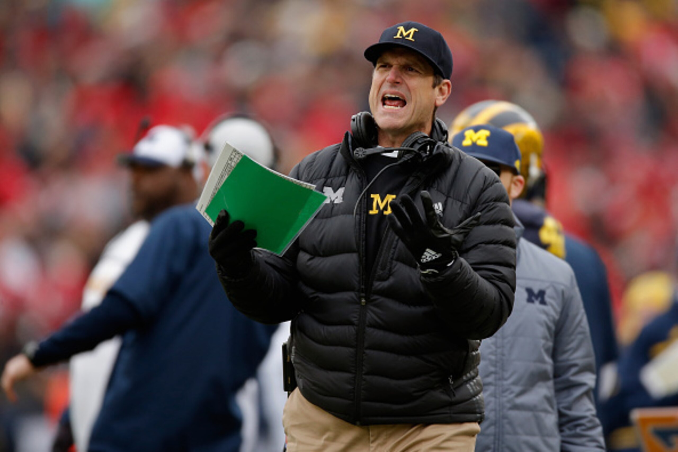 ANN ARBOR, MI - NOVEMBER 28:  Head coach Jim Harbaugh of the Michigan Wolverines looks on from the sideline in the first half against the Ohio State Buckeyes at Michigan Stadium on November 28, 2015 in Ann Arbor, Michigan.  (Photo by Gregory Shamus/Getty 