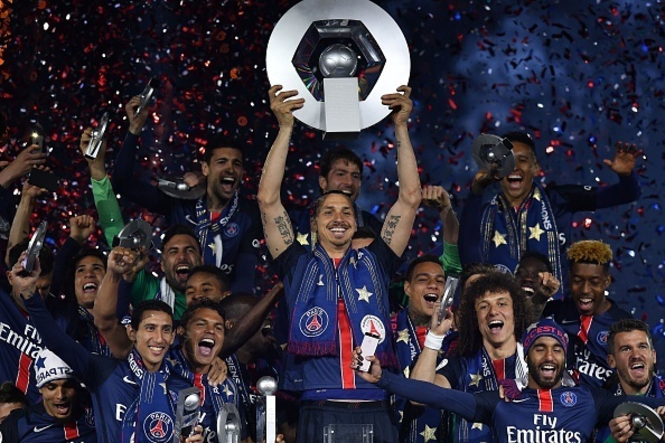Paris Saint-Germain's Swedish forward Zlatan Ibrahimovic holds the trophy on the podium after winning the French L1 title at the end of the French L1 football match Paris Saint-Germain (PSG) vs Nantes on May 14, 2016 at the Parc des Princes stadium in Par Paris Saint-Germain's Swedish forward Zlatan Ibrahimovic holds the trophy on the podium after winning the French L1 title at the end of the French L1 football match Paris Saint-Germain (PSG) vs Nantes on May 14, 2016 at the Parc des Princes stadium in Par