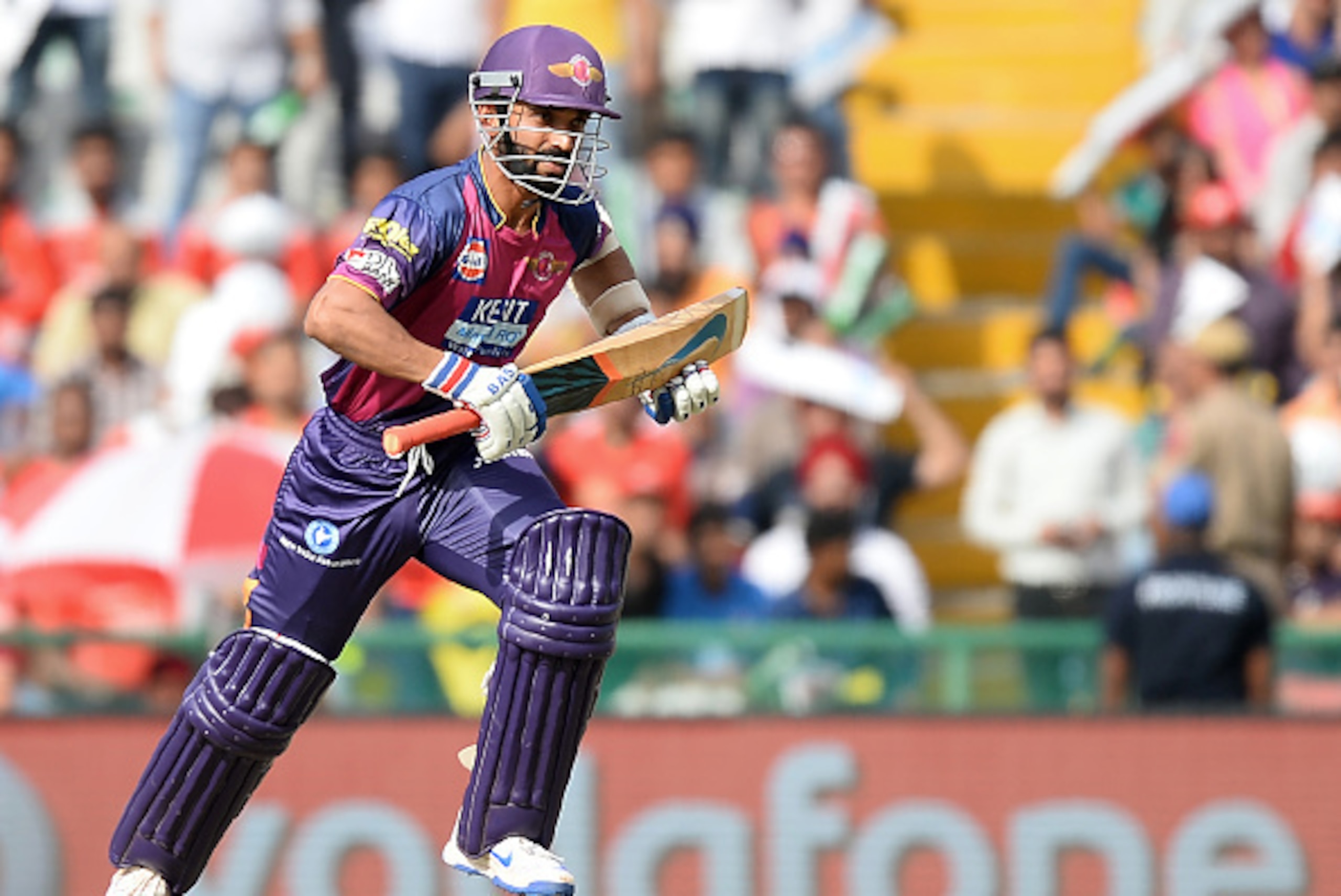 Rising Pune Supergiants batsman Ajinkya Rahane runs between the wickets during the 2016 Indian Premier League (IPL) Twenty20 cricket match between Rising Pune Supergiants and Kings XI Punjab at The Punjab Cricket Association Stadium in Mohali on April 17,