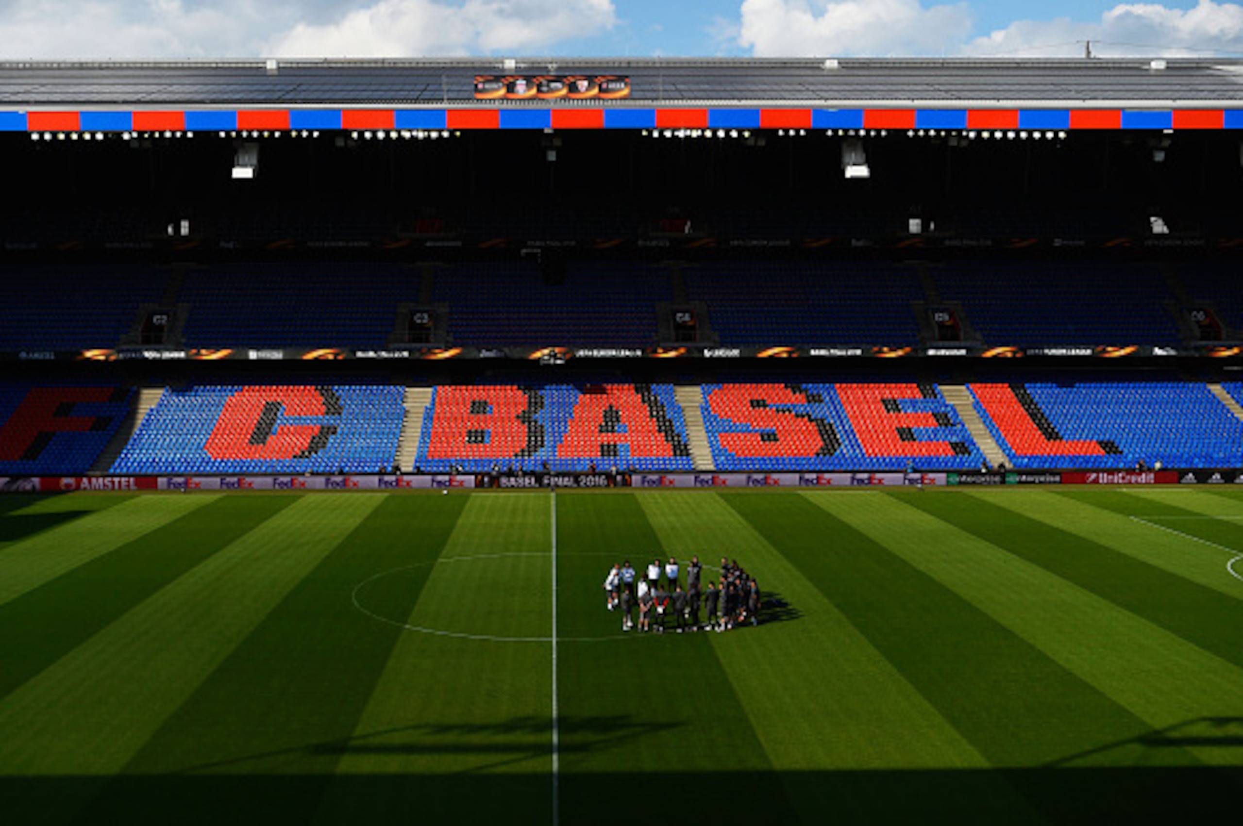 BASEL, SWITZERLAND - MAY 17:  A general view as Jurgen Klopp manager of Liverpool talks to players on the pitch during a Liverpool training session on the eve of the UEFA Europa League Final against Sevilla at St. Jakob-Park on May 17, 2016 in Basel, Swit