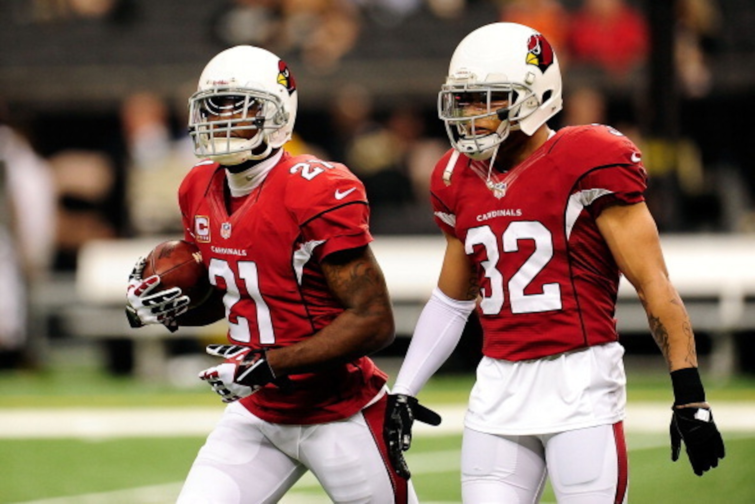 NEW ORLEANS, LA - SEPTEMBER 22:  Patrick Peterson #21 and Tyrann Mathieu #32 of the Arizona Cardinals participate in warmups prior to a game against the New Orleans Saints at the Mercedes-Benz Superdome on September 22, 2013 in New Orleans, Louisiana.  Th