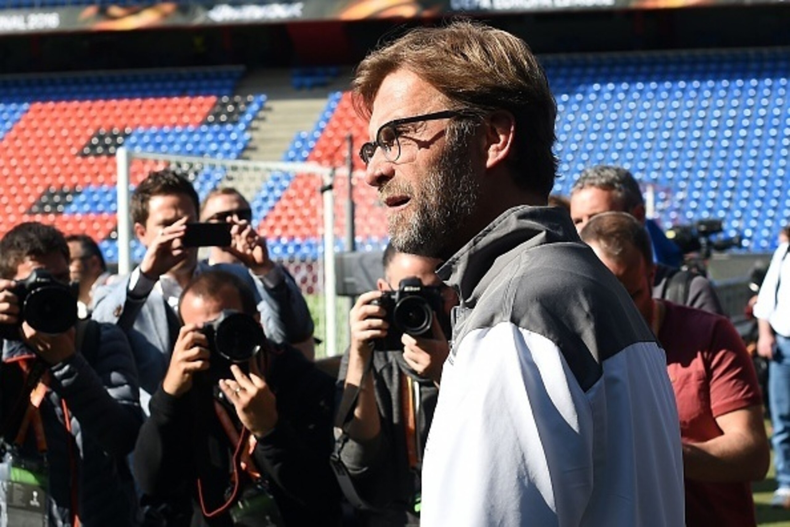 Liverpool's German manager Jurgen Klopp arrives for a training session of his team at the St Jakob-Park stadium in Basel, northern Switzerland, on May 17, 2016, on the eve of the UEFA Europa League final football match between Liverpool and Sevilla.  / AF
