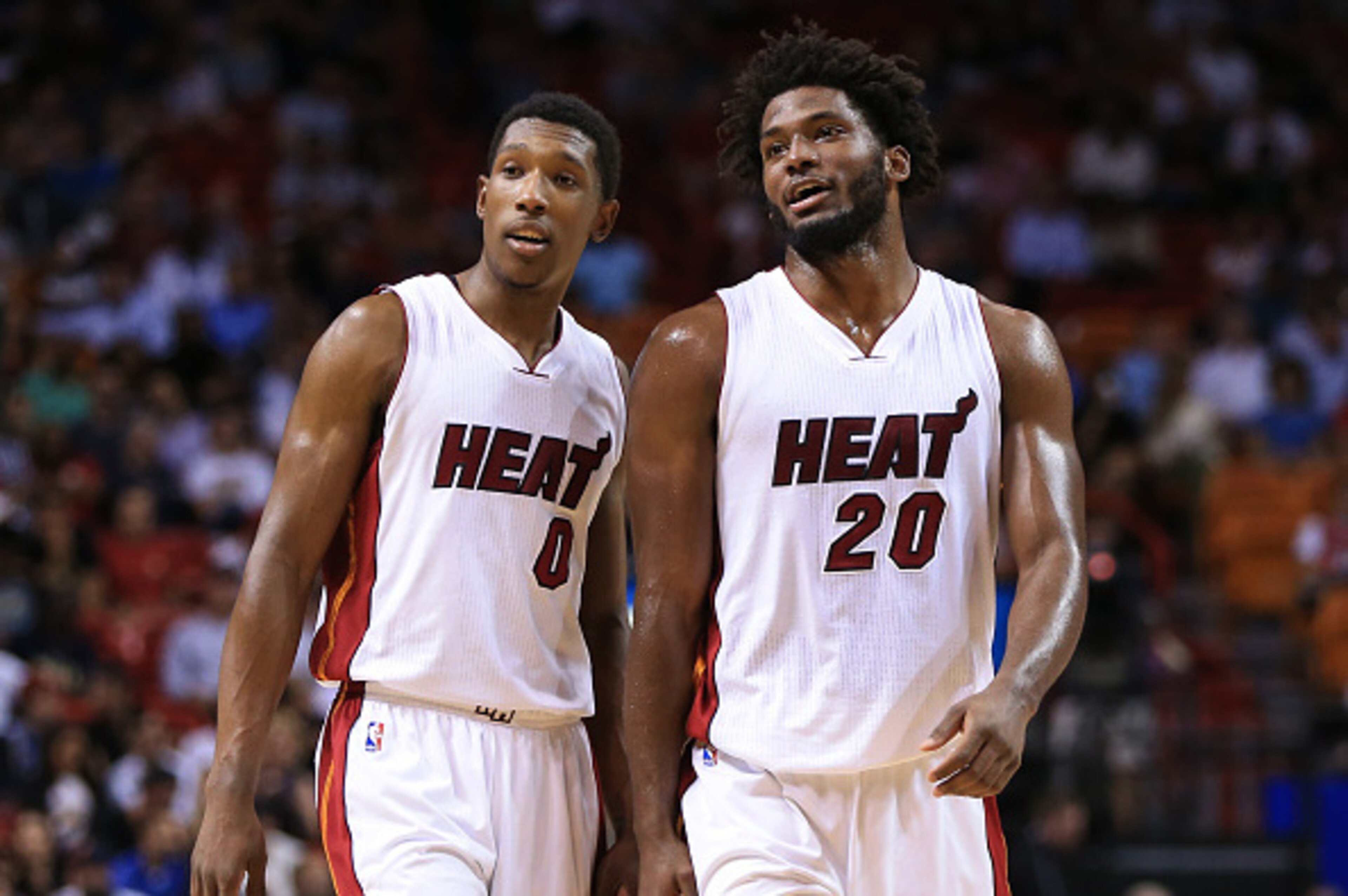 MIAMI, FLORIDA - APRIL 05: Josh Richardson #0 and Justise Winslow #20 of the Miami Heat look on during the first half of the game against the Detroit Pistons at the American Airlines Arena on April 5, 2016 in Miami, Florida. NOTE TO USER: User expressly a