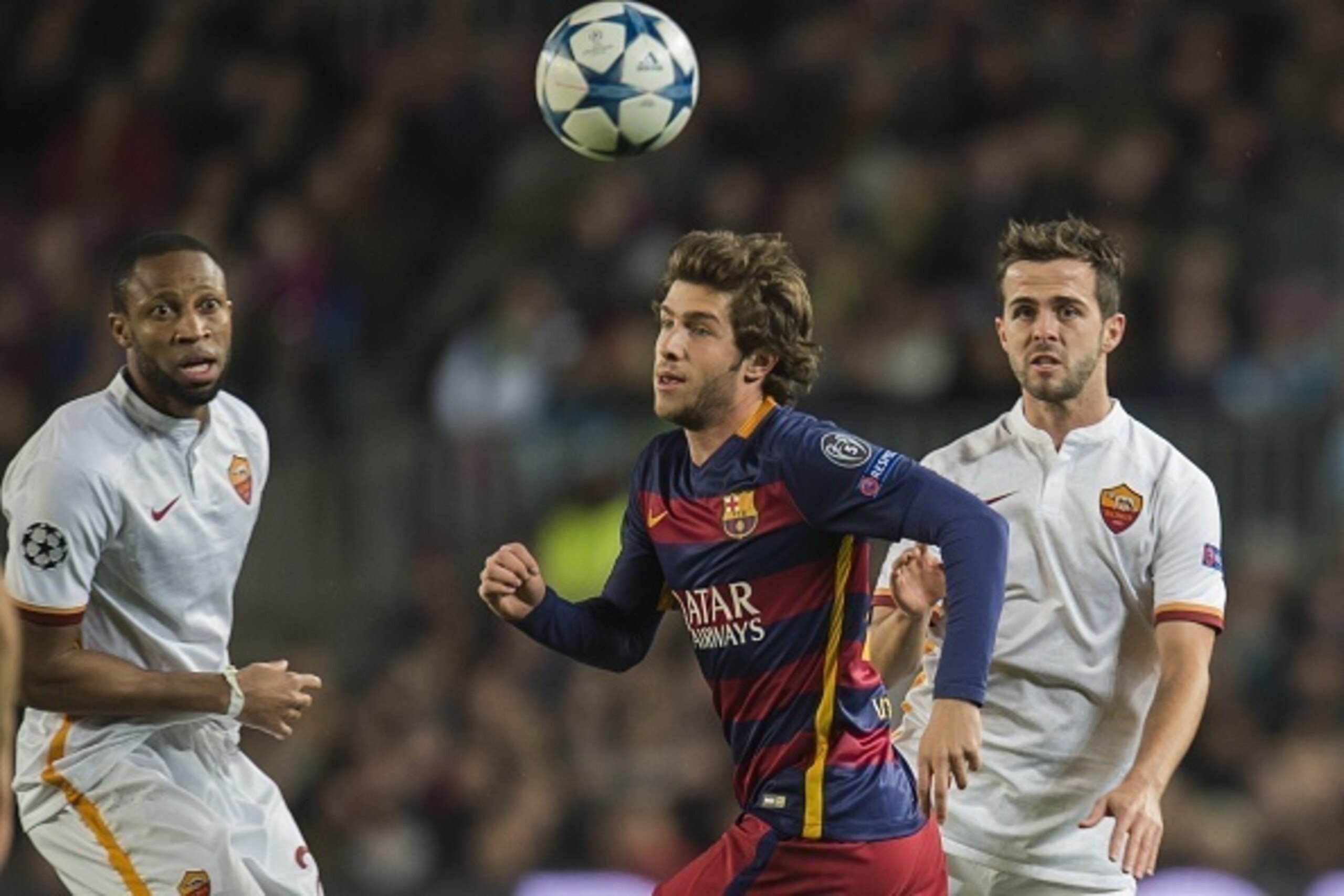 (L-R) Seydou Keita of AS Roma, Sergi Roberto Carnicer of FC Barcelona,  Miralem Pjanic of AS Roma during the Champions League match between FC Barcelona and AS Roma on November 24, 2015 at the Camp Nou stadium in Barcelona, Spain.(Photo by VI Images via G
