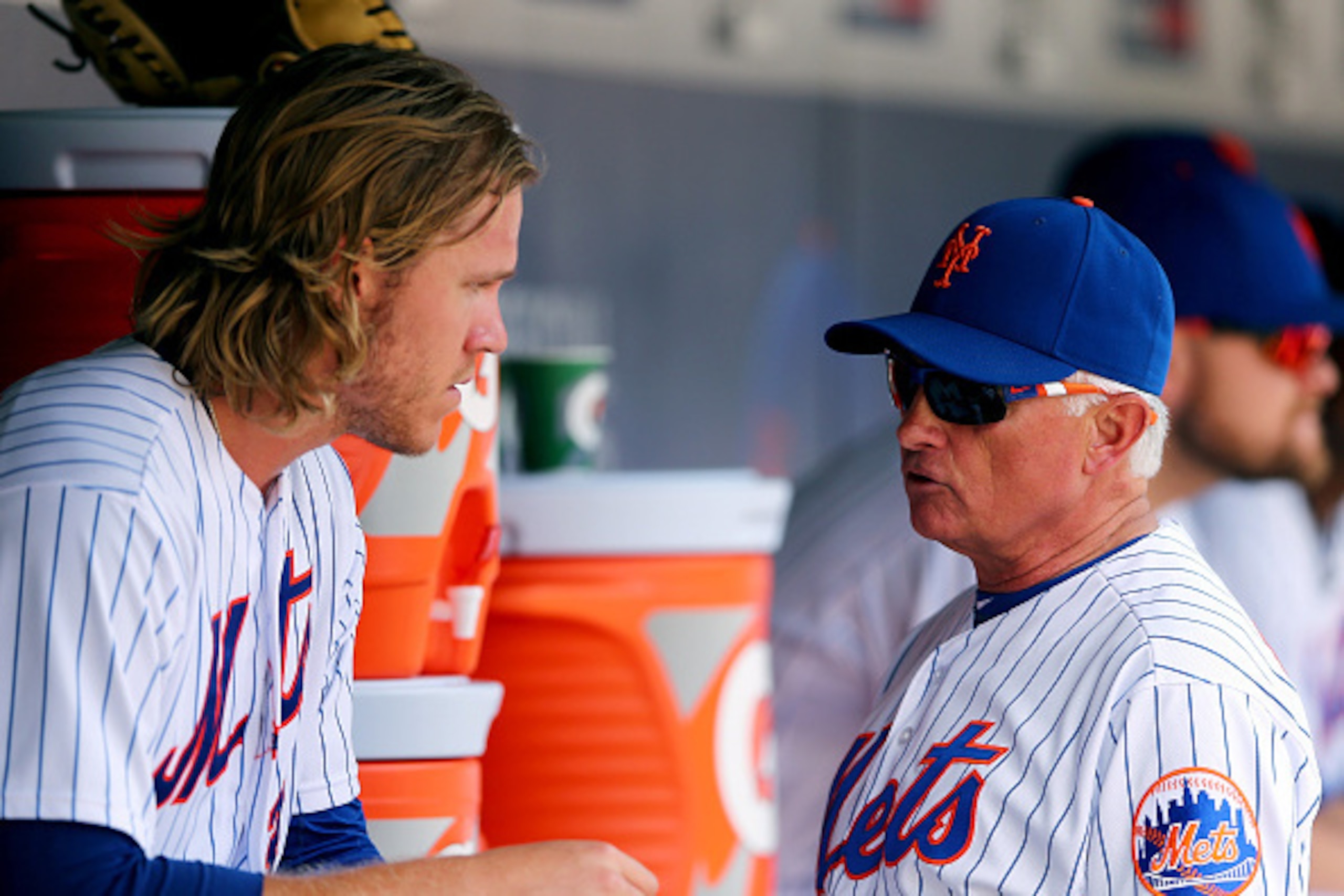 NEW YORK, NY - AUGUST 13:  Manager Terry Collins #10 of the New York Mets talks with starting pitcher Noah Syndergaard #34 in the dugout on August 13, 2015 at Citi Field in the Flushing neighborhood of the Queens borough of New York City.The New York Mets
