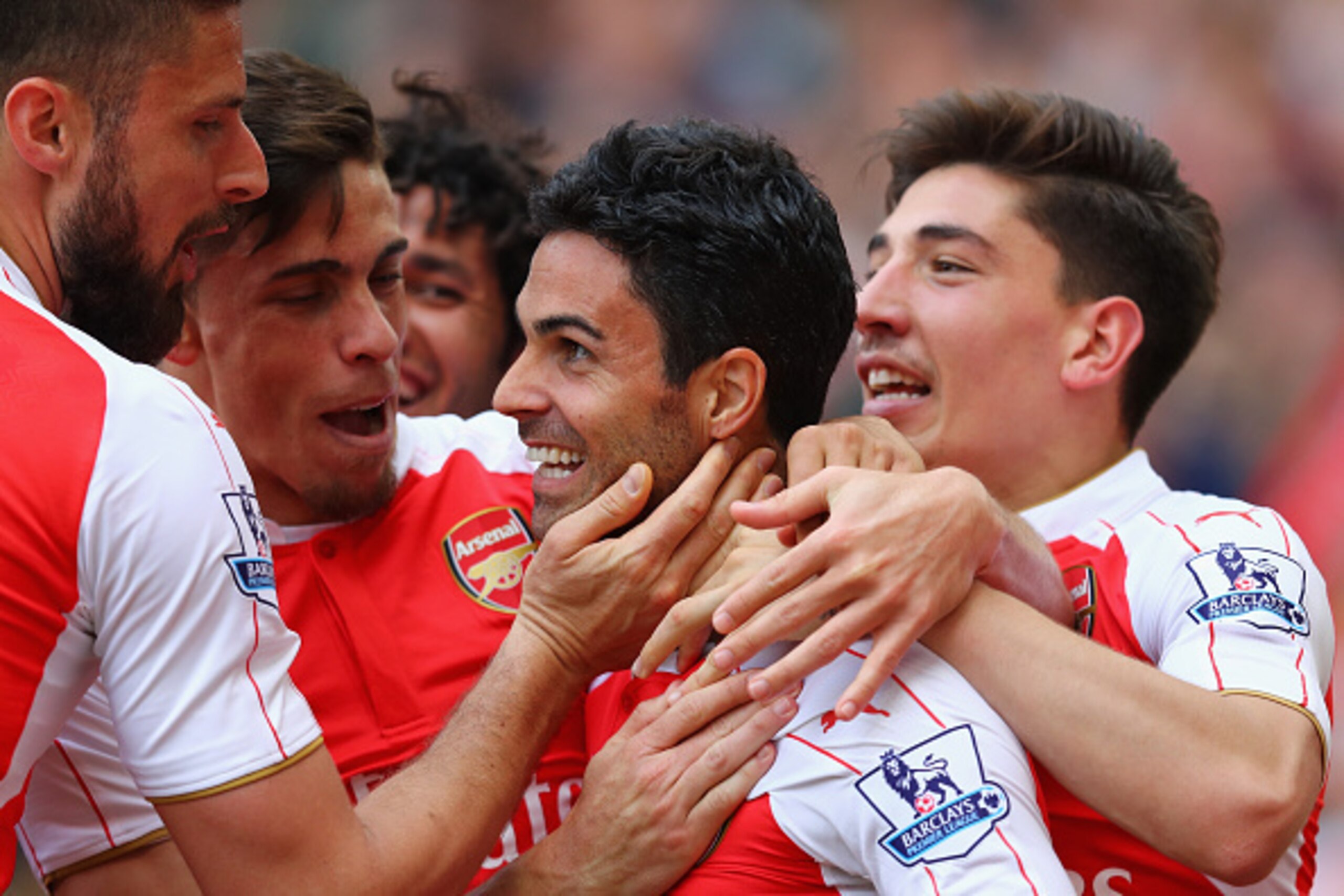 LONDON, ENGLAND - MAY 15:  Mikel Arteta of Arsenal is congratulated by team mates after scoring to make it 4-0 during the Barclays Premier League match between Arsenal and Aston Villa at the Emirates Stadium on May 15, 2016 in London, England.  (Photo by 