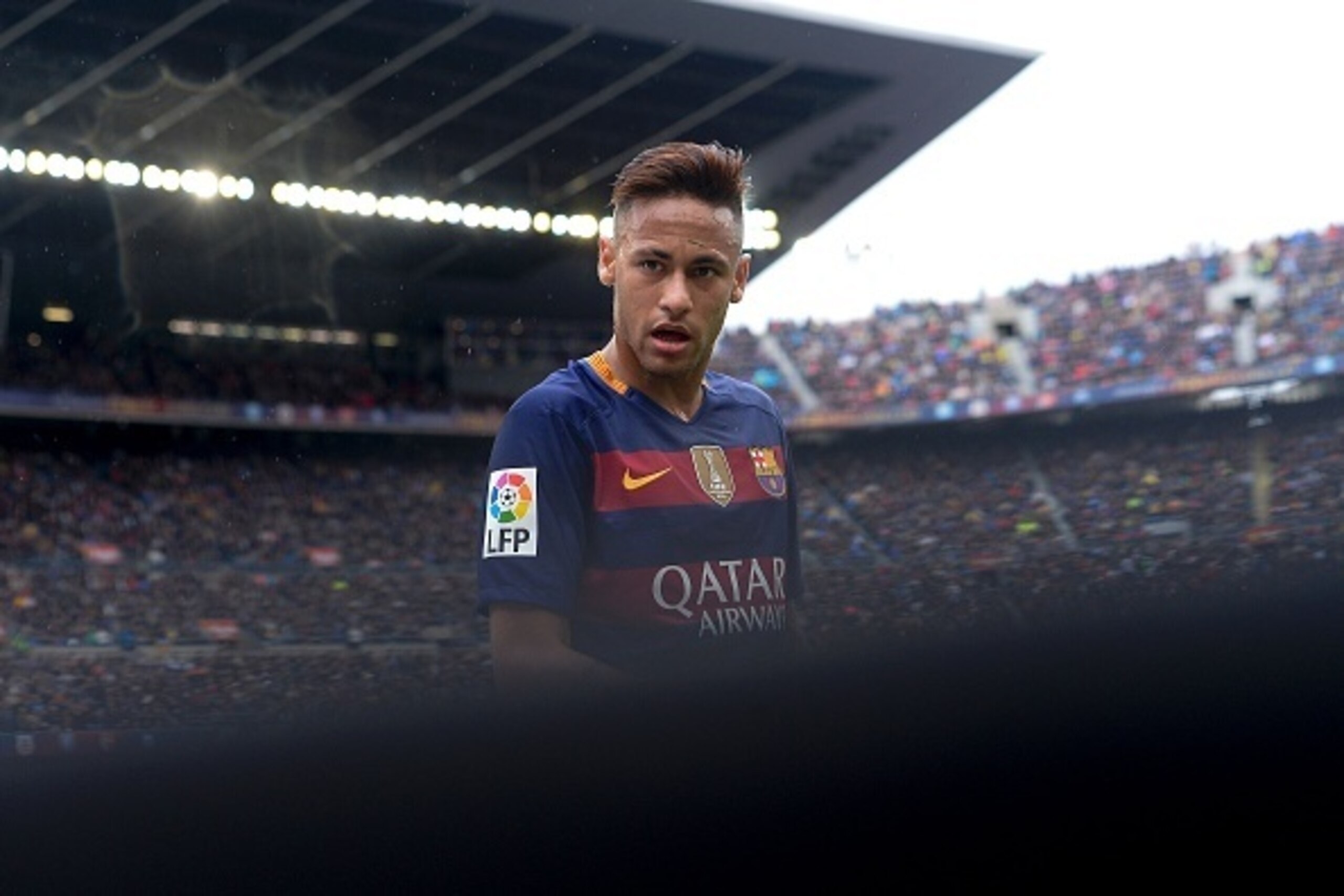 Barcelona's Brazilian forward Neymar looks on during the Spanish league football match FC Barcelona vs RCD Espanyol at the Camp Nou stadium in Barcelona on May 8, 2016. / AFP / JOSEP LAGO        (Photo credit should read JOSEP LAGO/AFP/Getty Images)