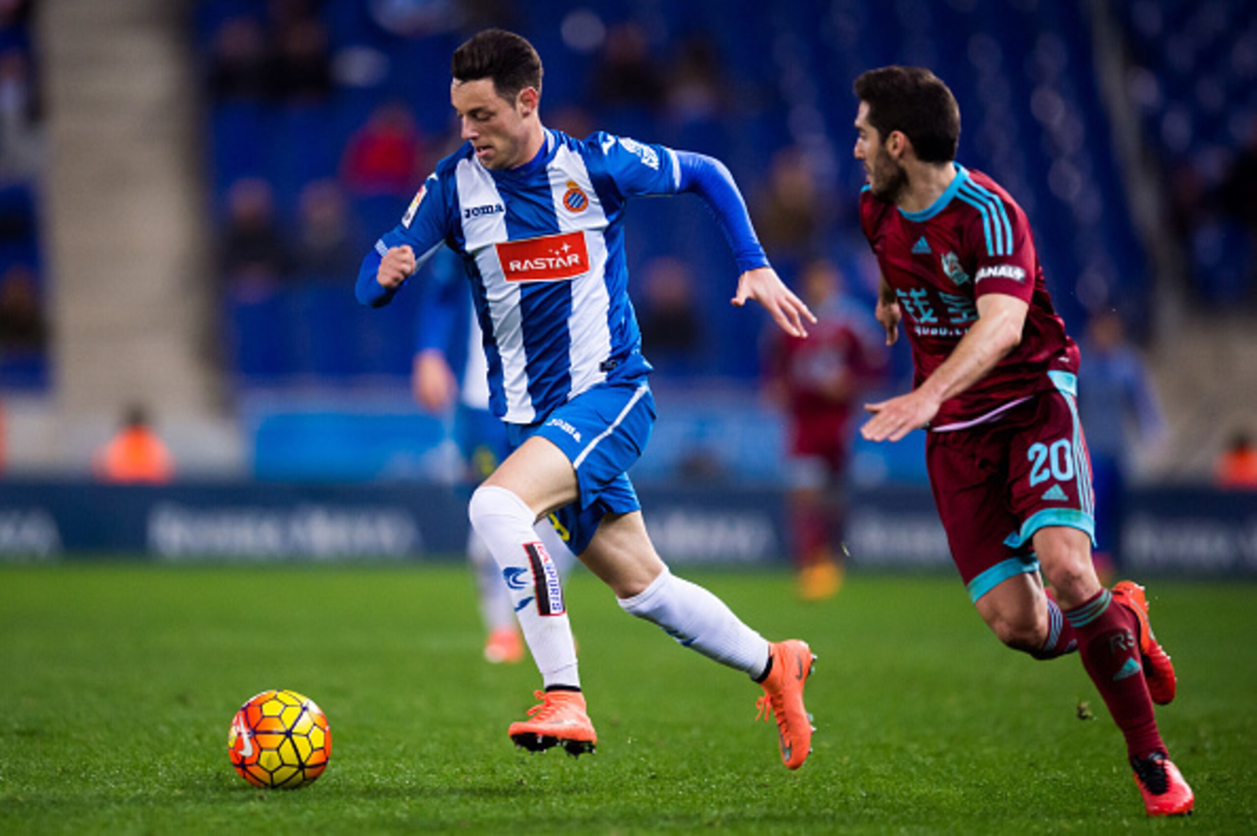 BARCELONA, SPAIN - FEBRUARY 08: Jorge Franco 'Burgui' (L) os RCD Espanyol conducts the ball next to Joseba Zaldua of Real Sociedad de Futbol during the La Liga match between RCD Espanyol and Real Sociedad de Futbol at Cornella-El Prat Stadium on February 