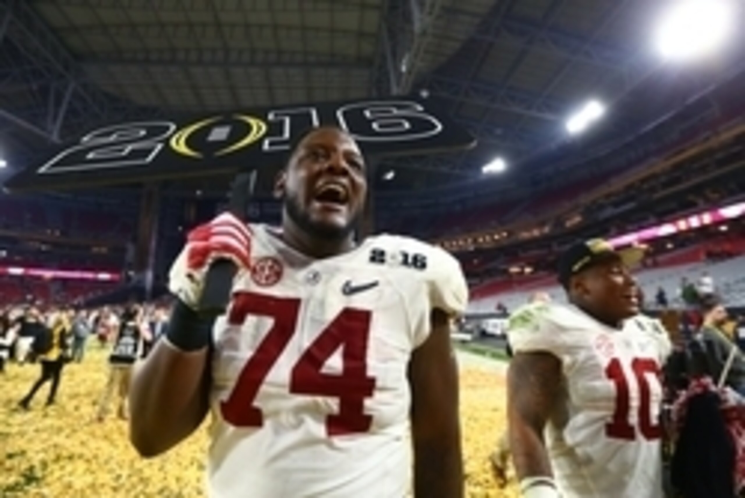 Jan 11, 2016; Glendale, AZ, USA; Alabama Crimson Tide offensive lineman Cam Robinson (74) and linebacker Reuben Foster (10) celebrate after defeating the Clemson Tigers in the 2016 CFP National Championship at University of Phoenix Stadium. Mandatory Cred