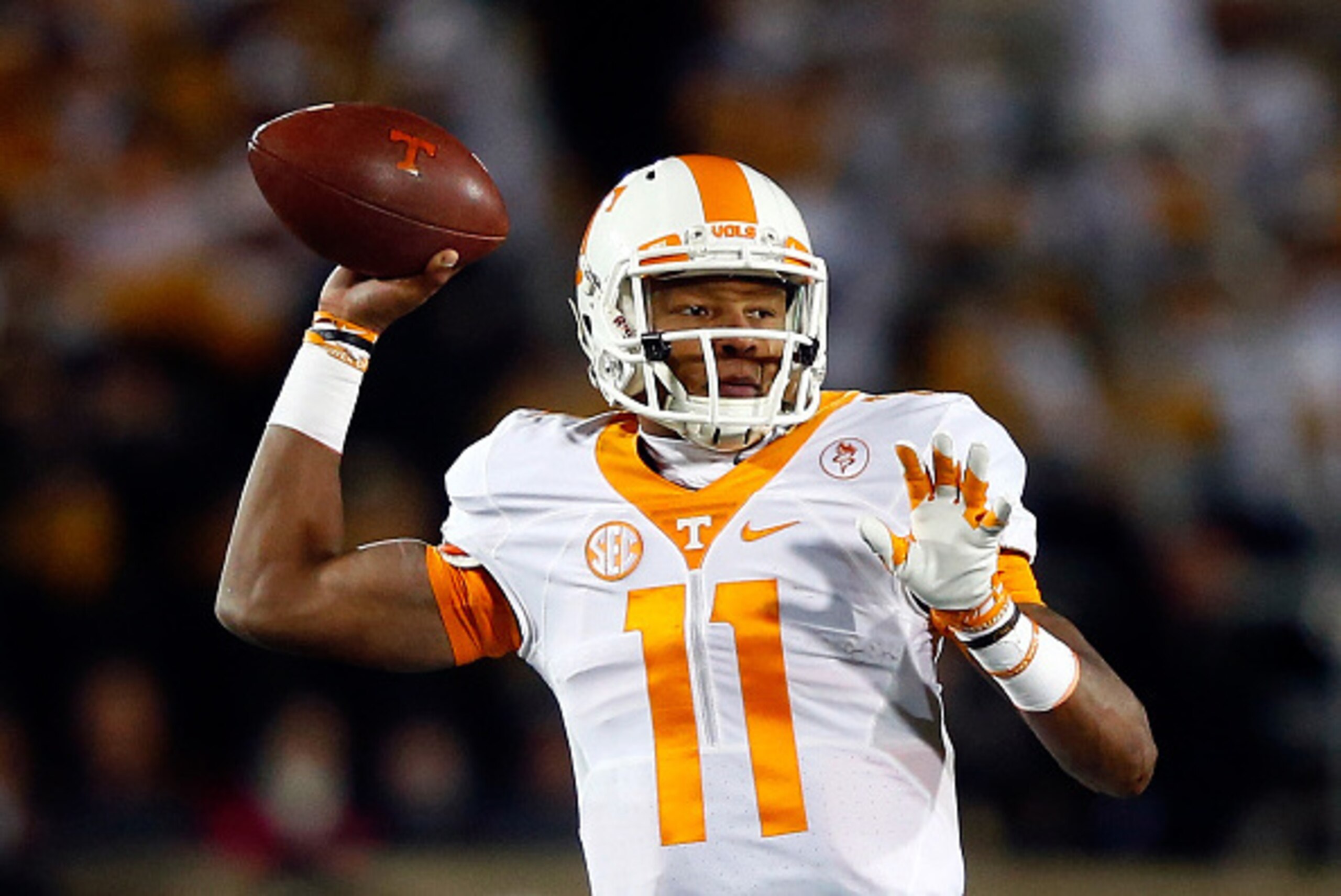 COLUMBIA, MO - NOVEMBER 21:  Quarterback Joshua Dobbs #11 of the Tennessee Volunteers passes during the game against the Missouri Tigers at Faurot Field/Memorial Stadium on November 21, 2015 in Columbia, Missouri.  (Photo by Jamie Squire/Getty Images)