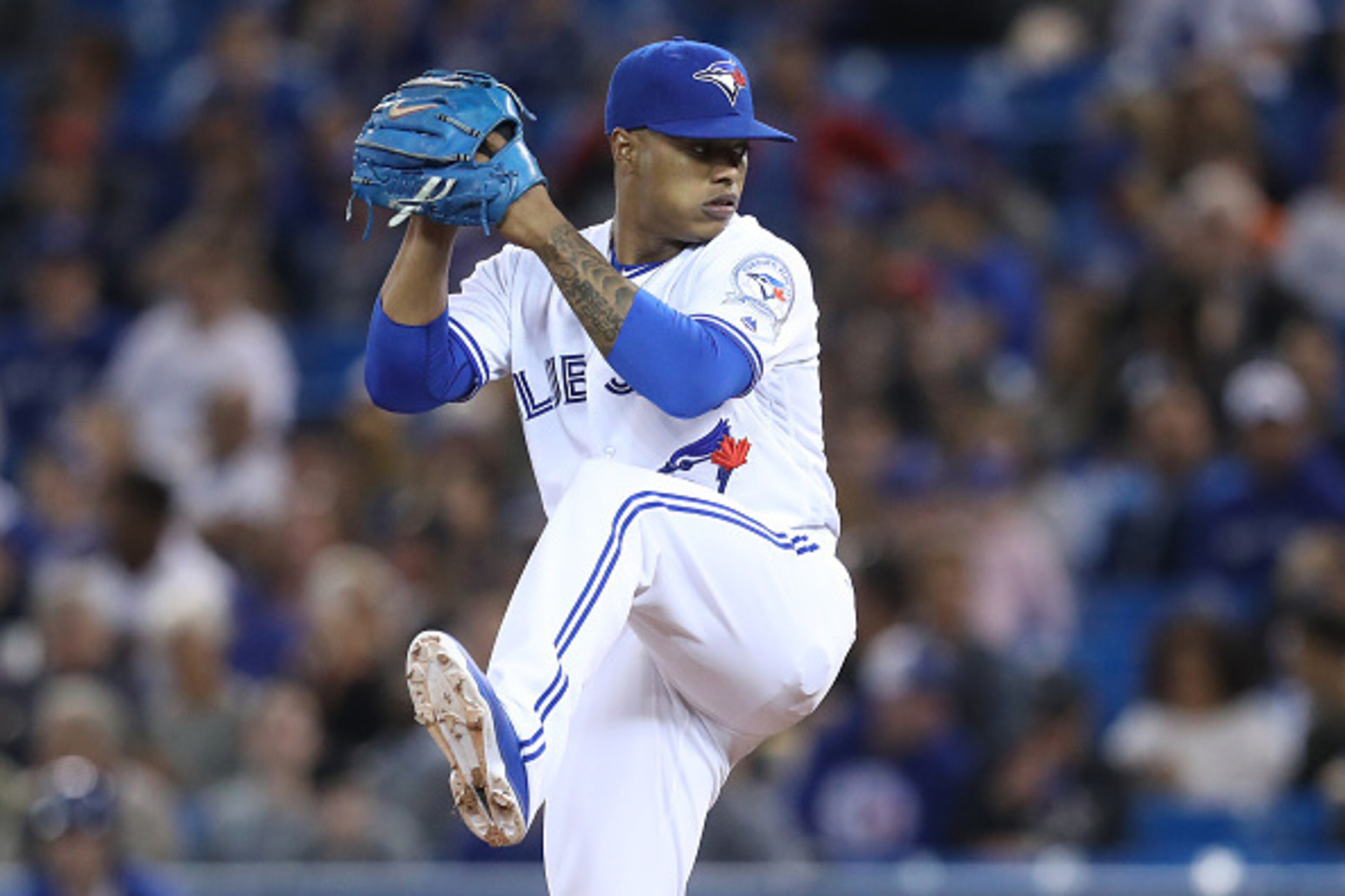 TORONTO, CANADA - MAY 17:  Marcus Stroman #6 of the Toronto Blue Jays delivers a pitch in the first inning during MLB game action against the Tampa Bay Rays on May 17, 2016 at Rogers Centre in Toronto, Ontario, Canada. (Photo by Tom Szczerbowski/Getty Ima