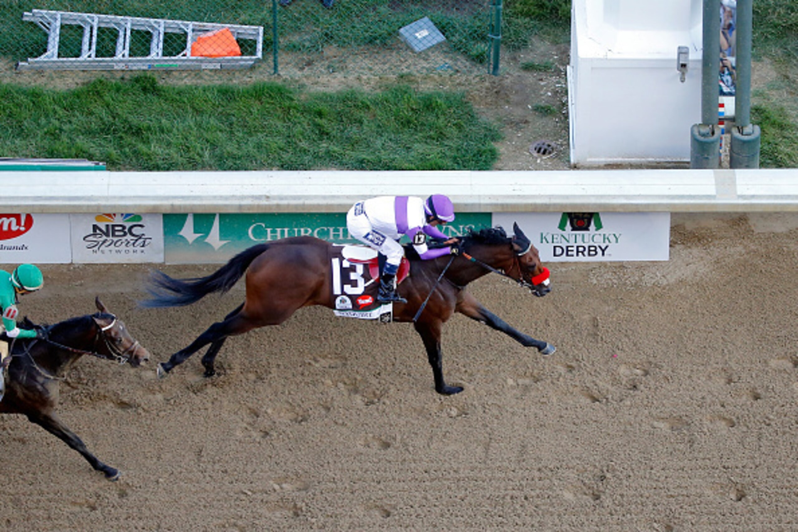 LOUISVILLE, KY - MAY 07: Nyquist #13, ridden by Mario Gutierrez, wins the Kentucky Derby on May 7, 2016 in Louisville, Kentucky. (Photo by Jon Durr/Eclipse Sportswire/Getty Images)
