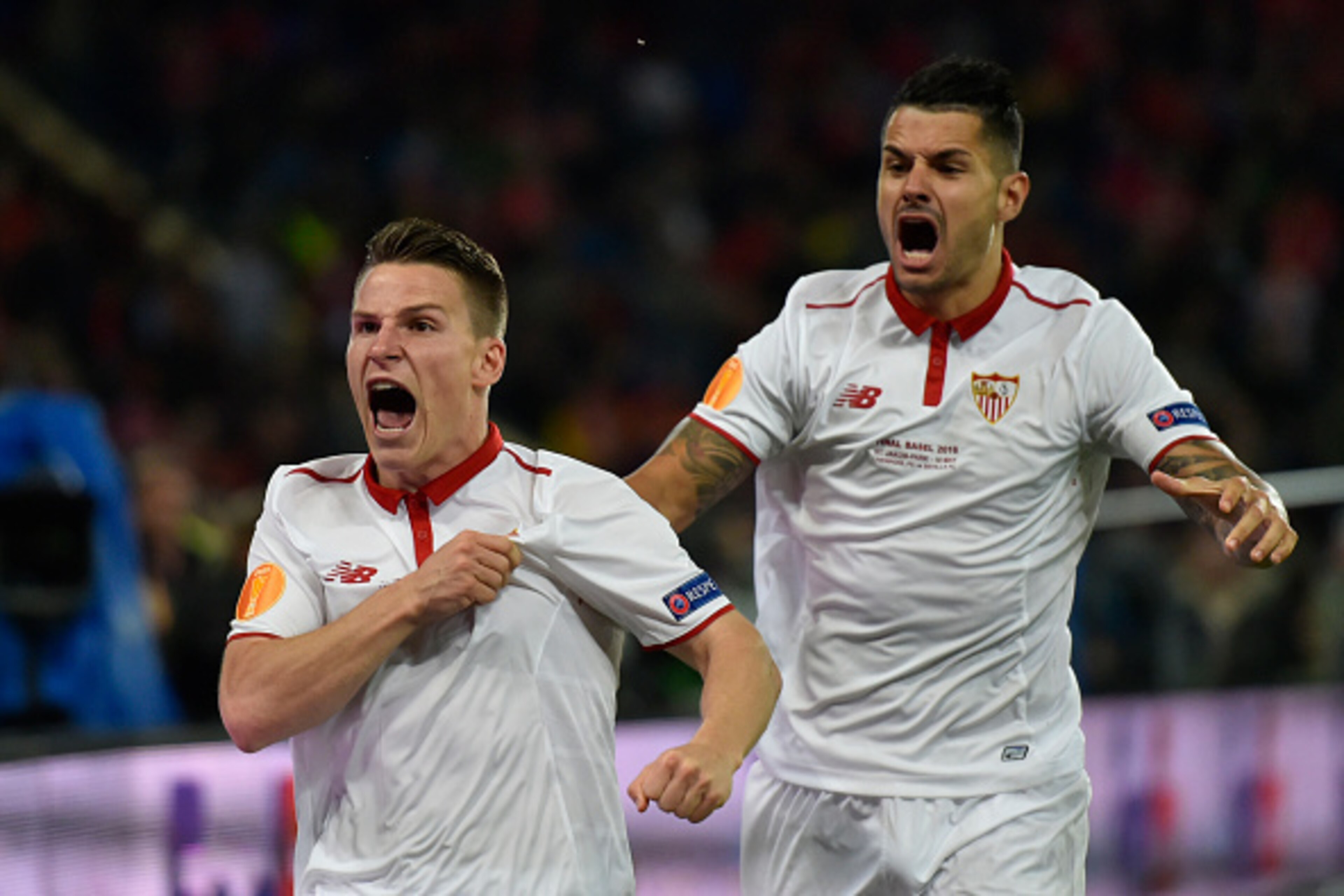 Sevilla's French forward Kevin Gameiro  (L) celebrates after scoring a goal  during the UEFA Europa League final football match between Liverpool FC and Sevilla FC at the St Jakob-Park stadium in Basel, on May 18, 2016.   AFP PHOTO / MICHAEL BUHOLZER / AF
