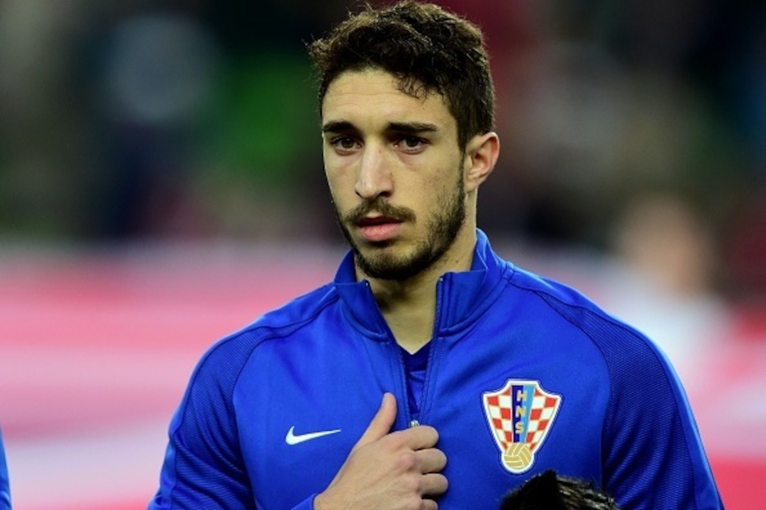Croatia's ime Vrsaljko listens to the anthems ahead the friendly football match Hungary v Croatia in Budapest, Hungary on March 26, 2016. / AFP / ATTILA KISBENEDEK        (Photo credit should read ATTILA KISBENEDEK/AFP/Getty Images)