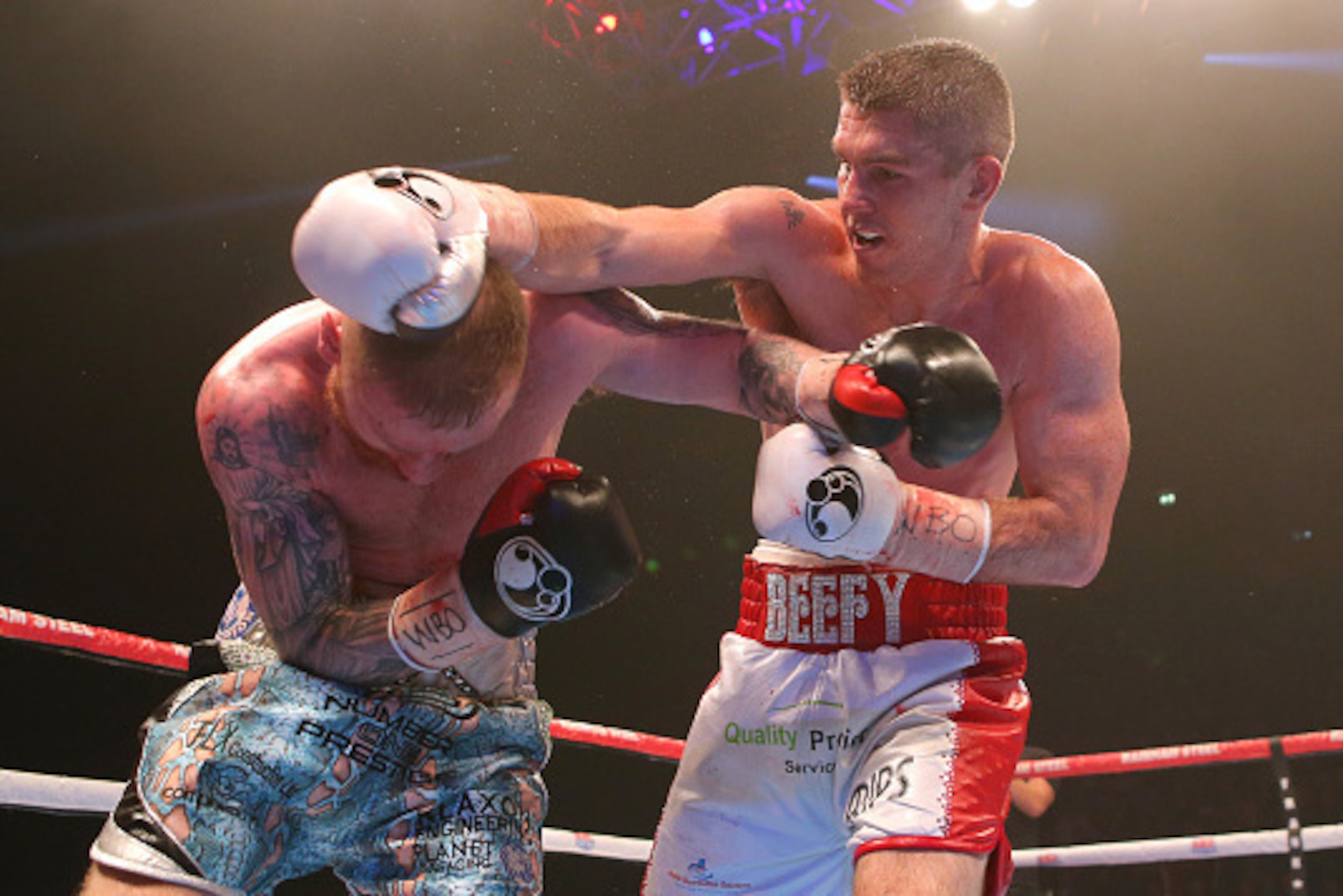 MANCHESTER, ENGLAND - DECEMBER 19: Liam Smith and Jimmy Kelly during their WBO World Super Welterweight title fight at the Manchester Arena on December 19, 2015 in Manchester, England. (Photo by Dave Thompson/Getty Images)