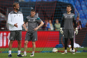 BASEL, SWITZERLAND - MAY 17:  Jurgen Klopp, manager of Liverpool gives instructions as James Milner and Simon Mignolet look on during a Liverpool training session on the eve of the UEFA Europa League Final against Sevilla at St. Jakob-Park on May 17, 2016