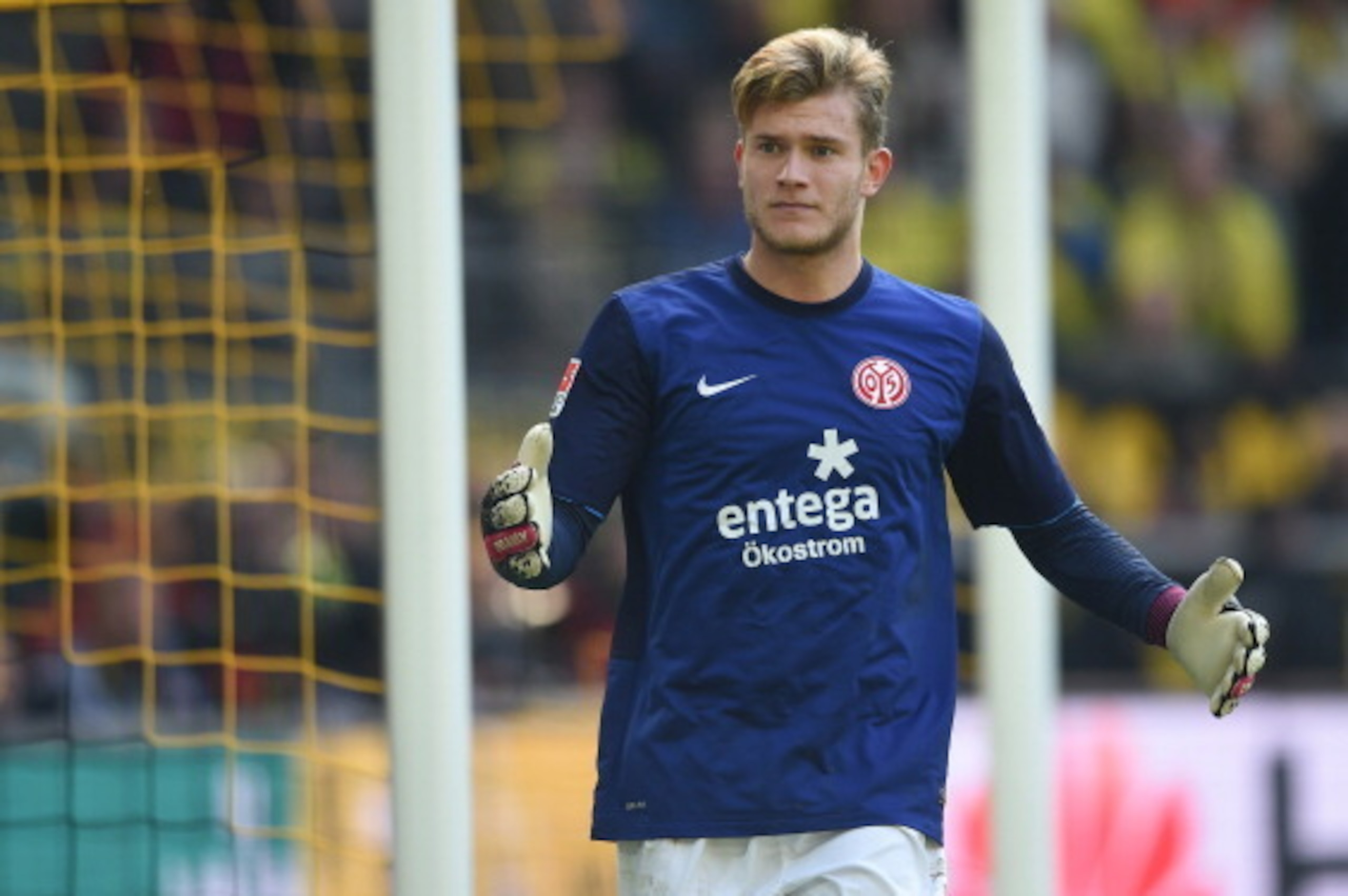 Mainz' goalkeeper Loris Karius reacts during the German first division Bundesliga football match Borussia Dortmund vs FSV Mainz 05 in Dortmund, western Germany, on April 19, 2014. Dortmund won the match 4-2. AFP PHOTO / PATRIK STOLLARZ
DFL RULES TO LIMIT Mainz' goalkeeper Loris Karius reacts during the German first division Bundesliga football match Borussia Dortmund vs FSV Mainz 05 in Dortmund, western Germany, on April 19, 2014. Dortmund won the match 4-2. AFP PHOTO / PATRIK STOLLARZ
DFL RULES TO LIMIT