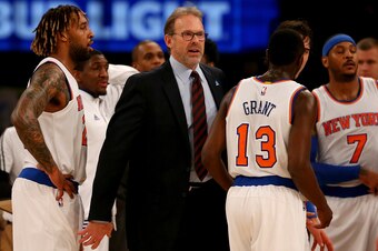 NEW YORK, NY - APRIL 01:  Head coach Kurt Rambis of the New York Knicks talks to his team during a time out in the first half against the Brooklyn Nets at Madison Square Garden on April 1, 2016 in New York City. NOTE TO USER: User expressly acknowledges a