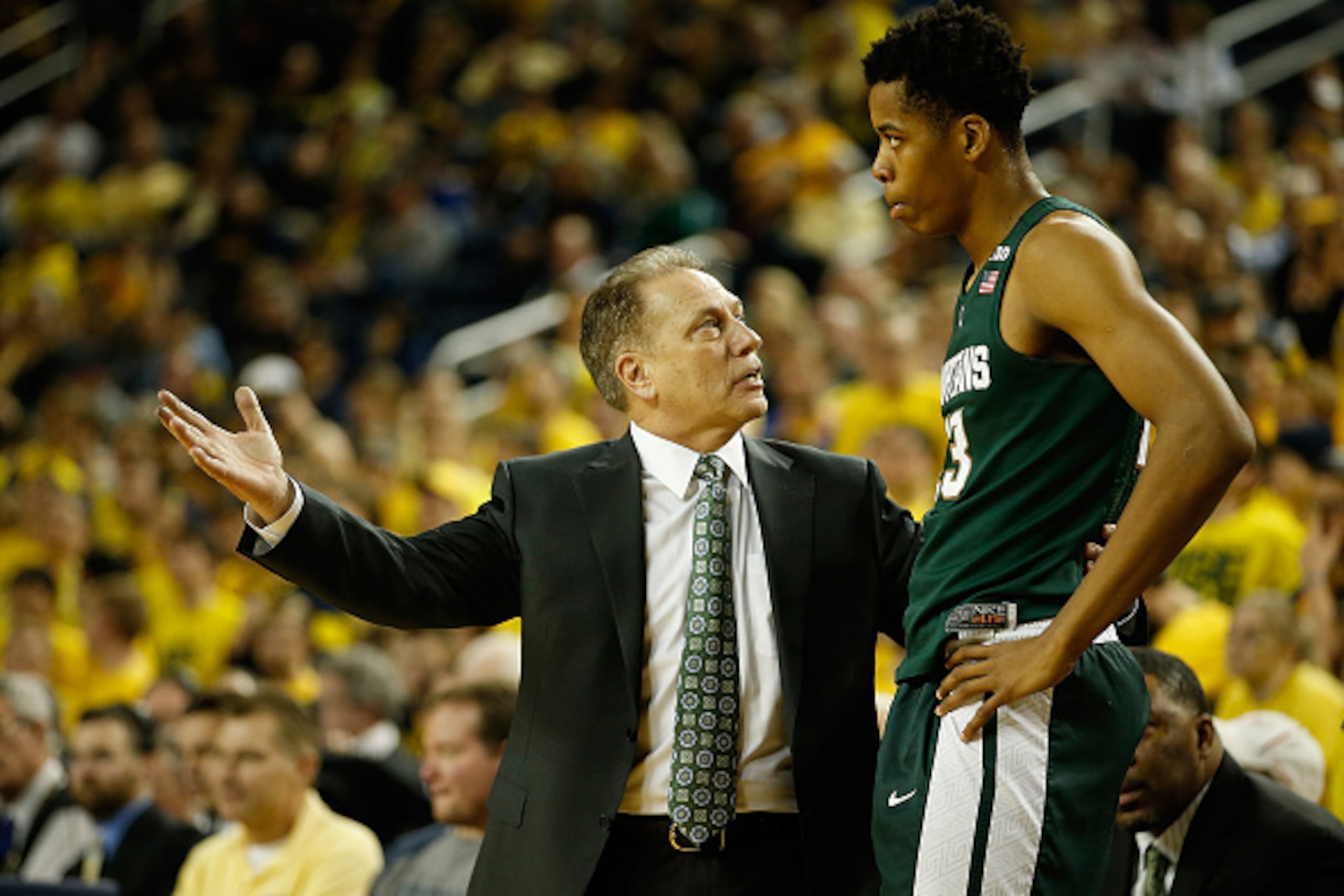 ANN ARBOR, MI - JANUARY 06: Head coach Tom Izzo of the Michigan State Spartans talks with Deyonta Davis #23 while playing the Michigan Wolverines at Crisler Center on January 6, 2016 in Ann Arbor, Michigan. (Photo by Gregory Shamus/Getty Images)