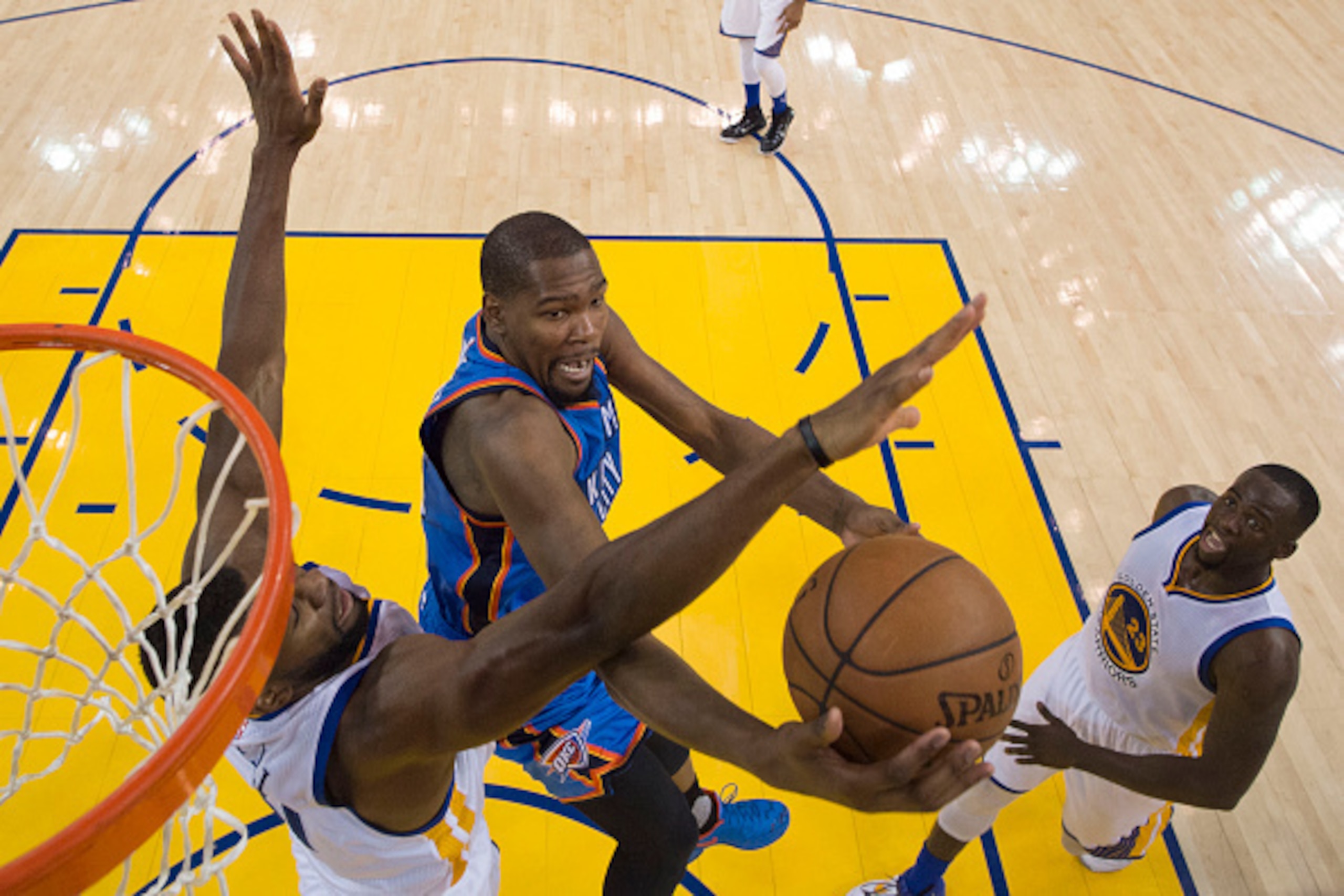 OAKLAND, CA - MAY 18:  Kevin Durant #35 of the Oklahoma City Thunder goes up for a shot against Festus Ezeli #31 of the Golden State Warriors during game two of the Western Conference Finals during the 2016 NBA Playoffs at ORACLE Arena on May 18, 2016 in 