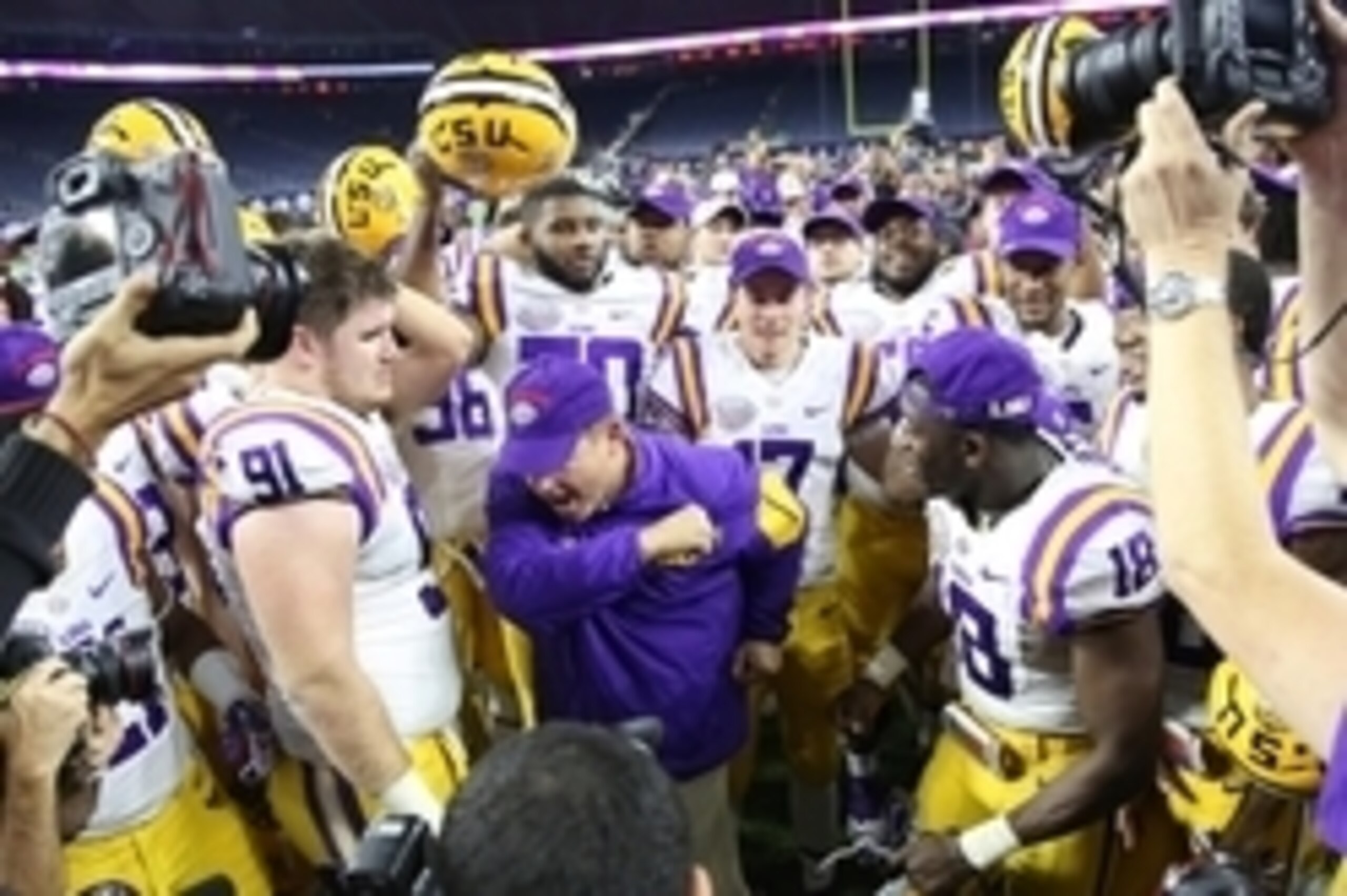 Dec 29, 2015; Houston, TX, USA; LSU Tigers head coach Les Miles celebrates defeating the Texas Tech Red Raiders at NRG Stadium. LSU won 56 to 27. Mandatory Credit: Thomas B. Shea-USA TODAY Sports