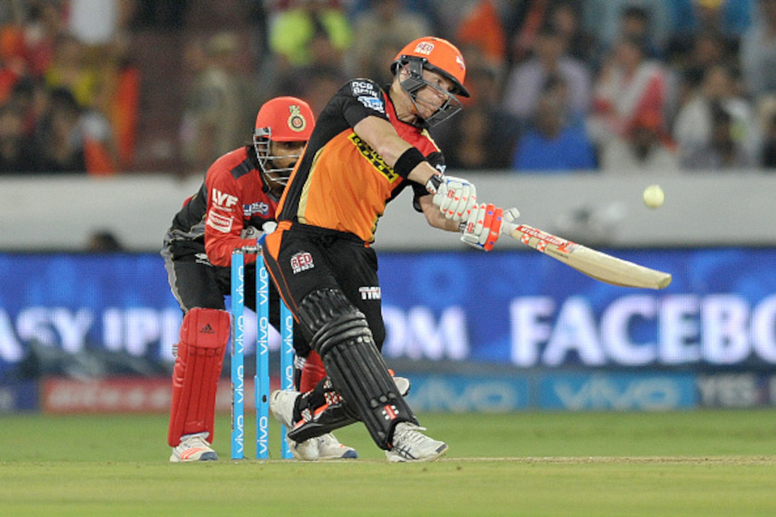 Sunrisers Hyderabad captain David Warner plays a shot during the 2016 Indian Premier League (IPL) Twenty20 cricket match between Sunrisers Hyderabad and Royal Challengers Bangalore at The Rajiv Gandhi International Stadium in Hyderabad  on April 30, 2016.