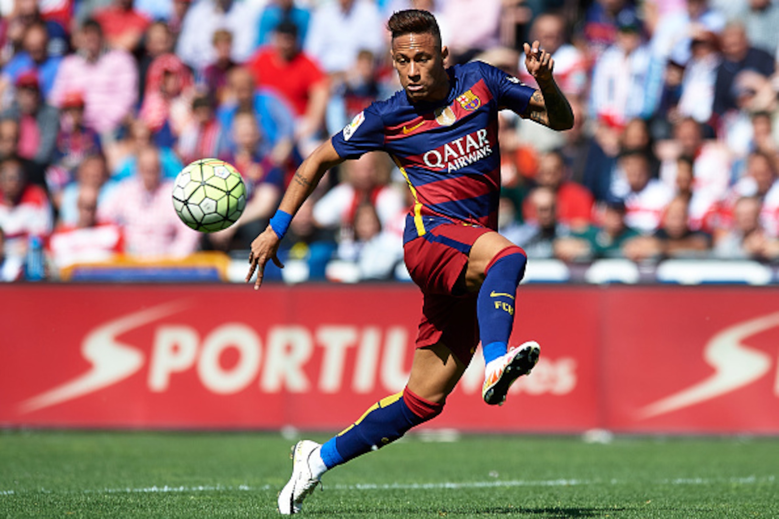 GRANADA, SPAIN - MAY 14: Neymar JR of FC Barcelona controls the ball during the La Liga match between Granada CF and FC Barcelona at Estadio Nuevo Los Carmenes on May 14, 2016 in Granada, Spain.  (Photo by Manuel Queimadelos Alonso/Getty Images)