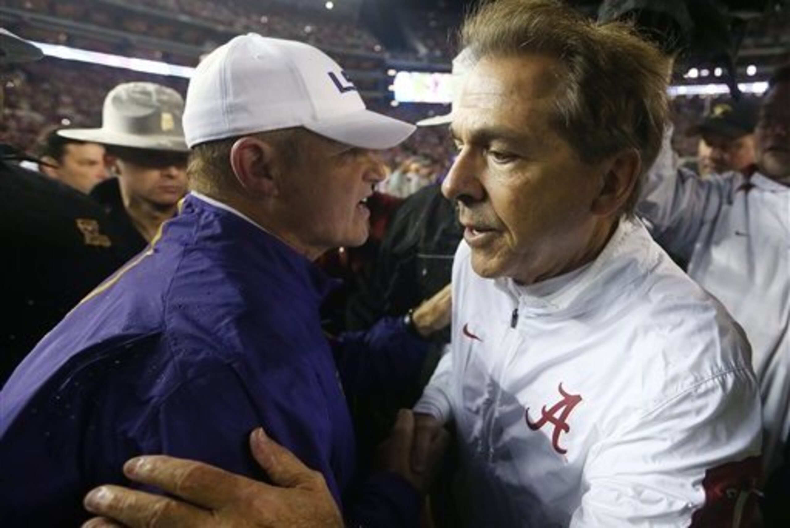 LSU head coach Les Miles (left) and Alabama head coach Nick Saban
