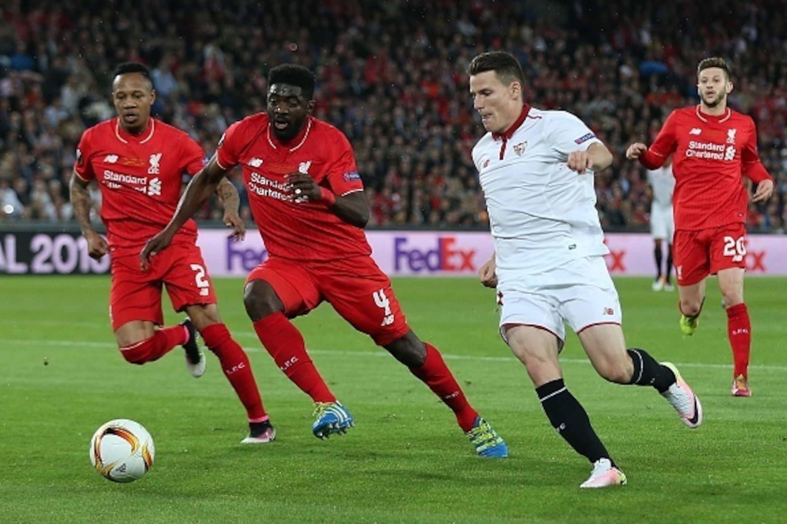BASEL, SWITZERLAND - MAY 18: Kolo Toure of Liverpool in action with Kevin Gameiro of Sevilla during the UEFA Europa League Final match between Liverpool and Sevilla at St. Jakob-Park on May 18, 2016 in Basel, Switzerland. (Photo by Chris Brunskill Ltd/Get