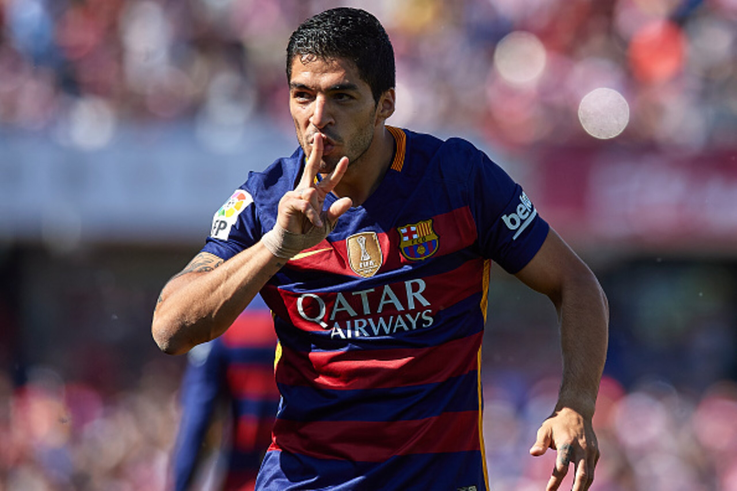 GRANADA, SPAIN - MAY 14:  Luis Suarez (9)of FC Barcelona celebrates scoring his team's first during the La Liga match between Granada CF and FC Barcelona at Estadio Nuevo Los Carmenes on May 14, 2016 in Granada, Spain.  (Photo by Manuel Queimadelos Alonso