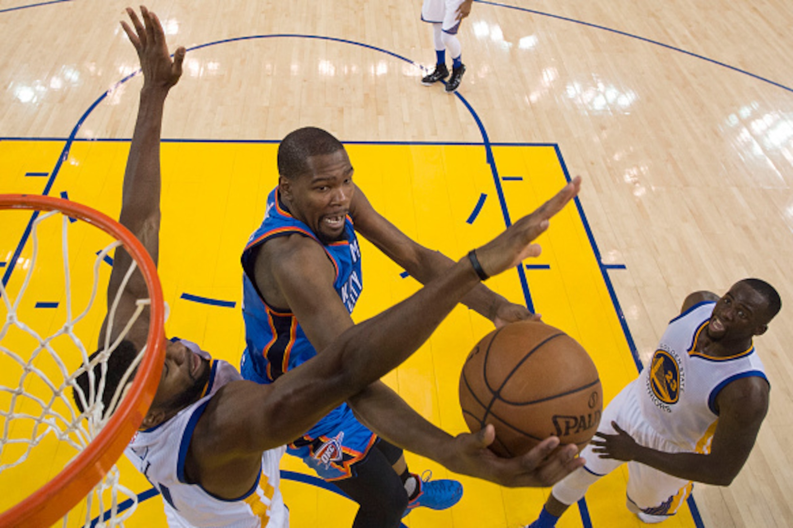 OAKLAND, CA - MAY 18:  Kevin Durant #35 of the Oklahoma City Thunder goes up for a shot against Festus Ezeli #31 of the Golden State Warriors during game two of the Western Conference Finals during the 2016 NBA Playoffs at ORACLE Arena on May 18, 2016 in 