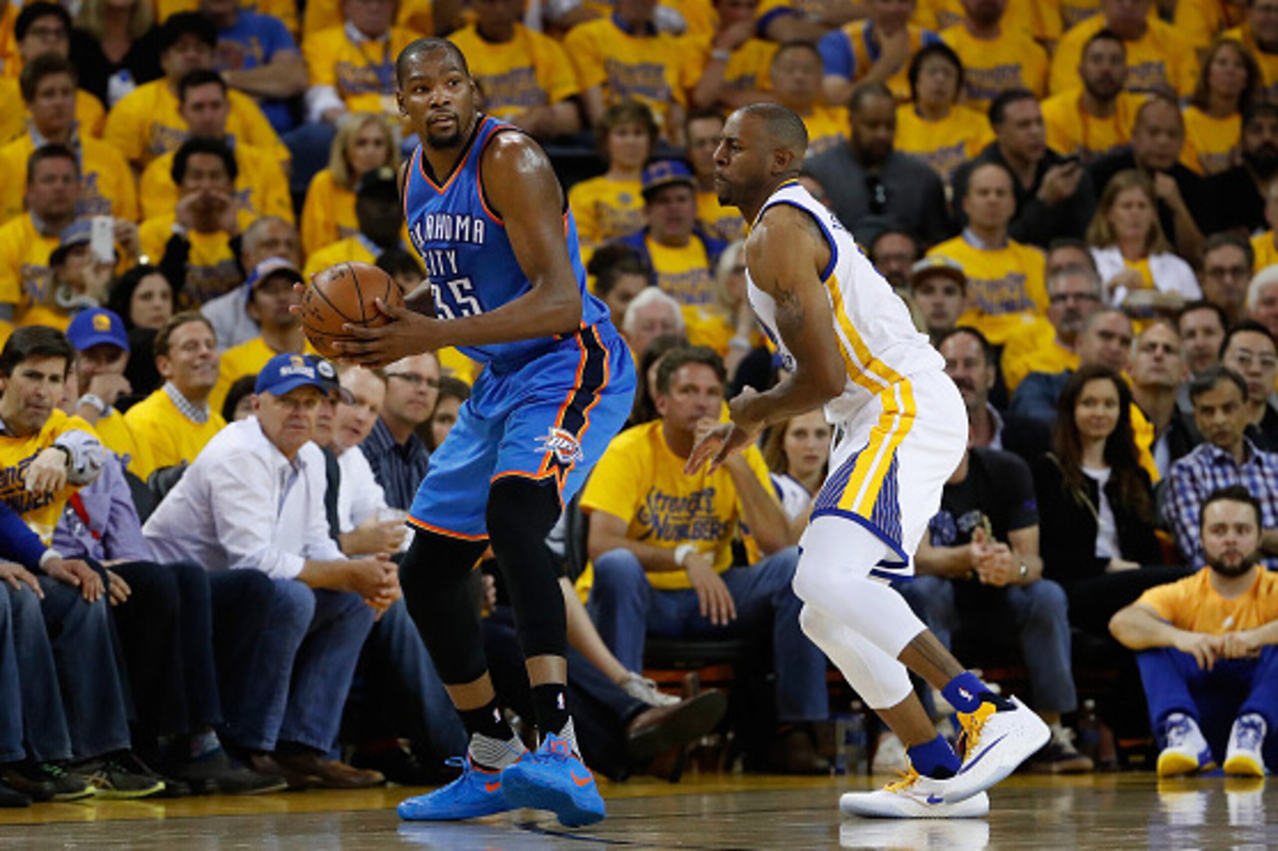 OAKLAND, CA - MAY 16:  Kevin Durant #35 of the Oklahoma City Thunder handles the ball against Andre Iguodala #9 of the Golden State Warriors during game one of the NBA Western Conference Finals at ORACLE Arena on May 16, 2016 in Oakland, California. The T