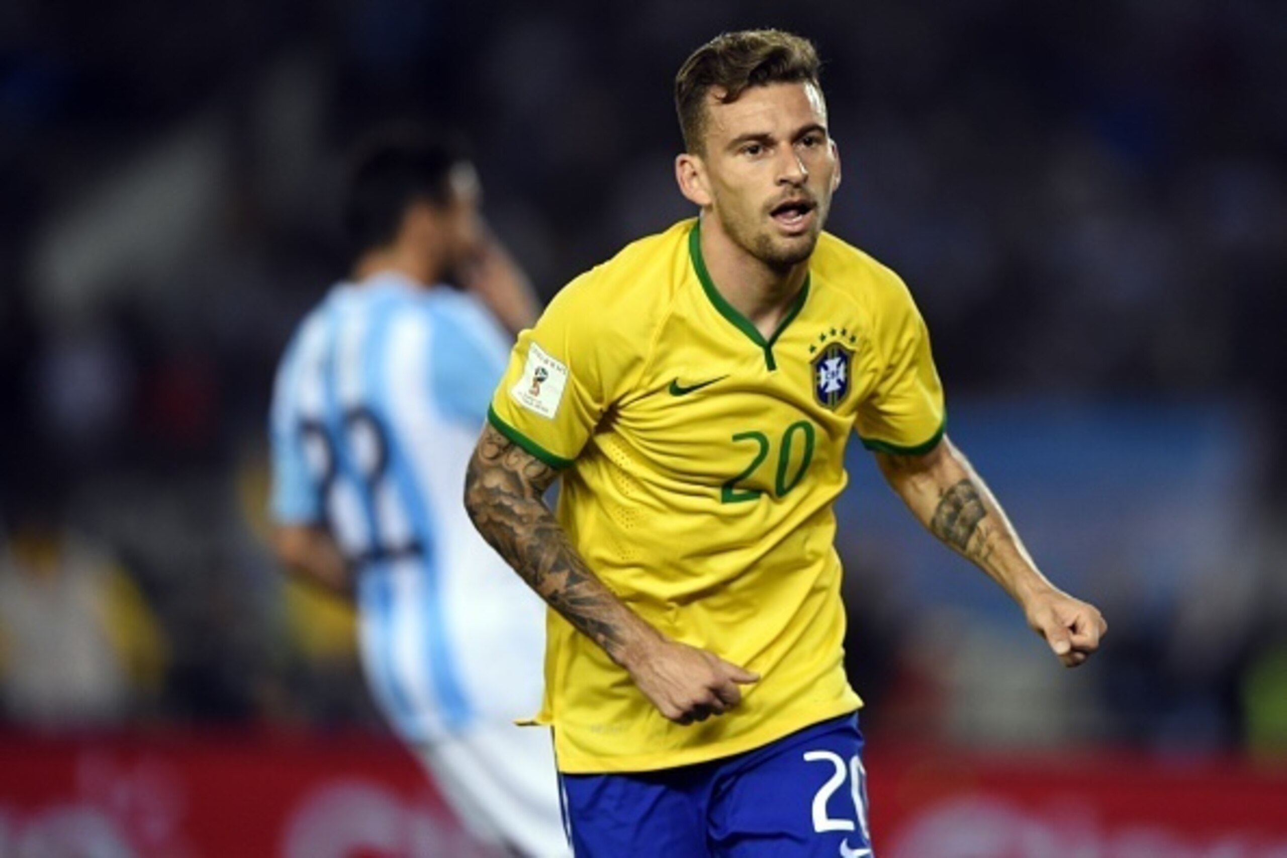 Brazil's Lucas Lima celebrates after scoring against Argentina during their Russia 2018 FIFA World Cup South American Qualifiers football match, in Buenos Aires, on November 13, 2015. AFP PHOTO / EITAN ABRAMOVICH        (Photo credit should read EITAN ABR