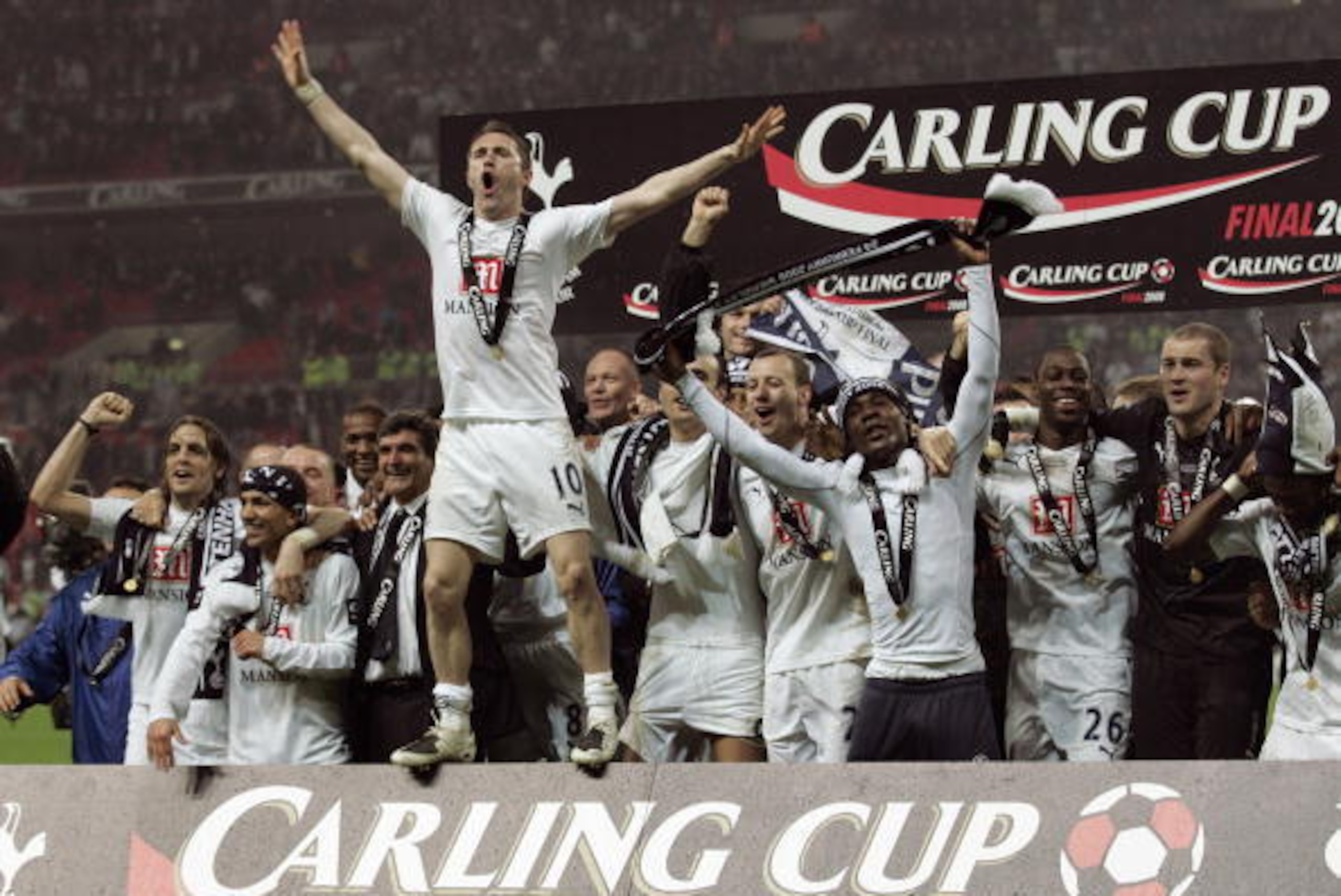Tottenham Hotspur's Irish striker Robbie Keane (4L) celebrates with teammates after winning the Carling Cup Final against Chelsea at Wembley Stadium in London on February 24, 2008. Tottenham Hotspur won the game 2-1. AFP PHOTO GLYN KIRK Mobile and websit Tottenham Hotspur's Irish striker Robbie Keane (4L) celebrates with teammates after winning the Carling Cup Final against Chelsea at Wembley Stadium in London on February 24, 2008. Tottenham Hotspur won the game 2-1. AFP PHOTO GLYN KIRK Mobile and websit